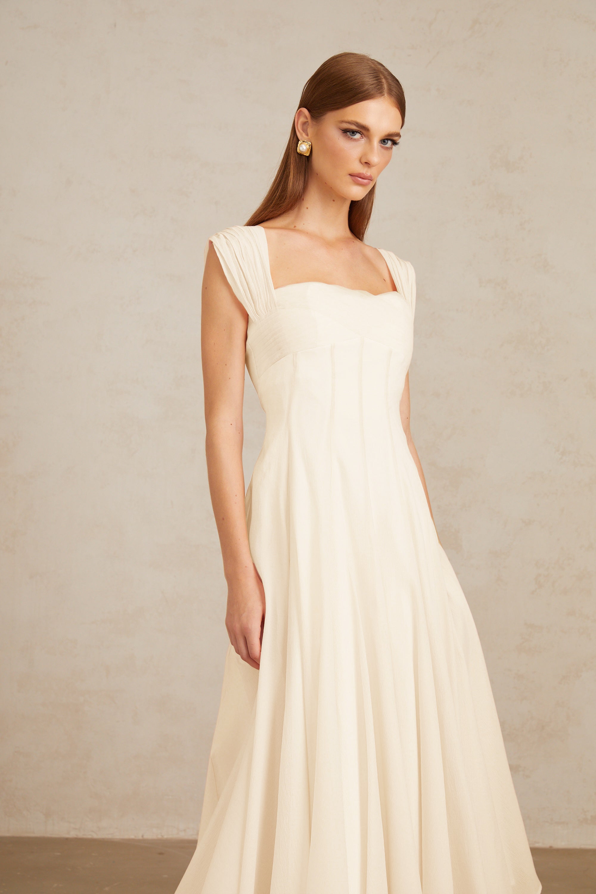 Érasme Cremeweißes Midikleid mit Volant