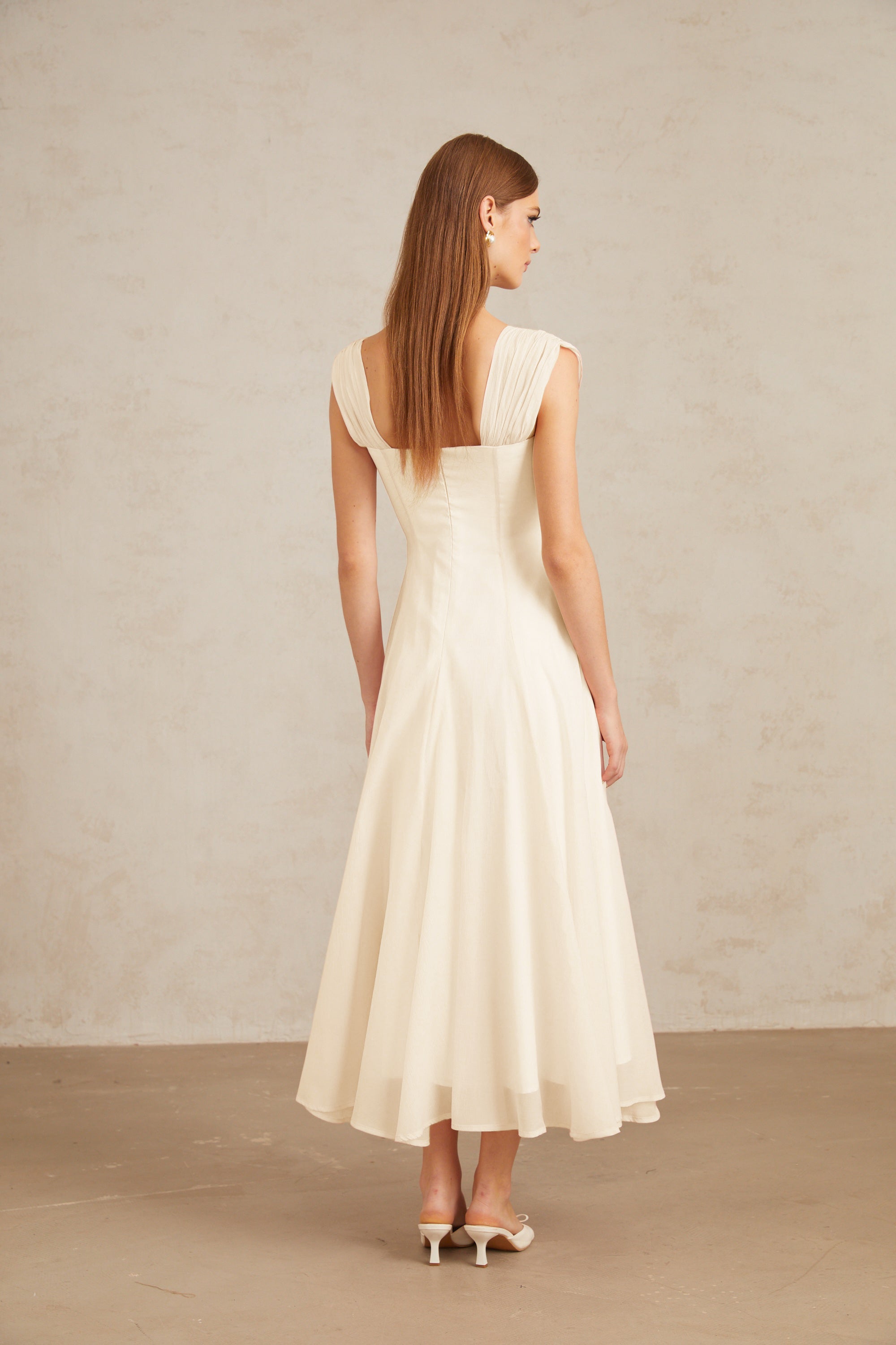 Érasme Cremeweißes Midikleid mit Volant