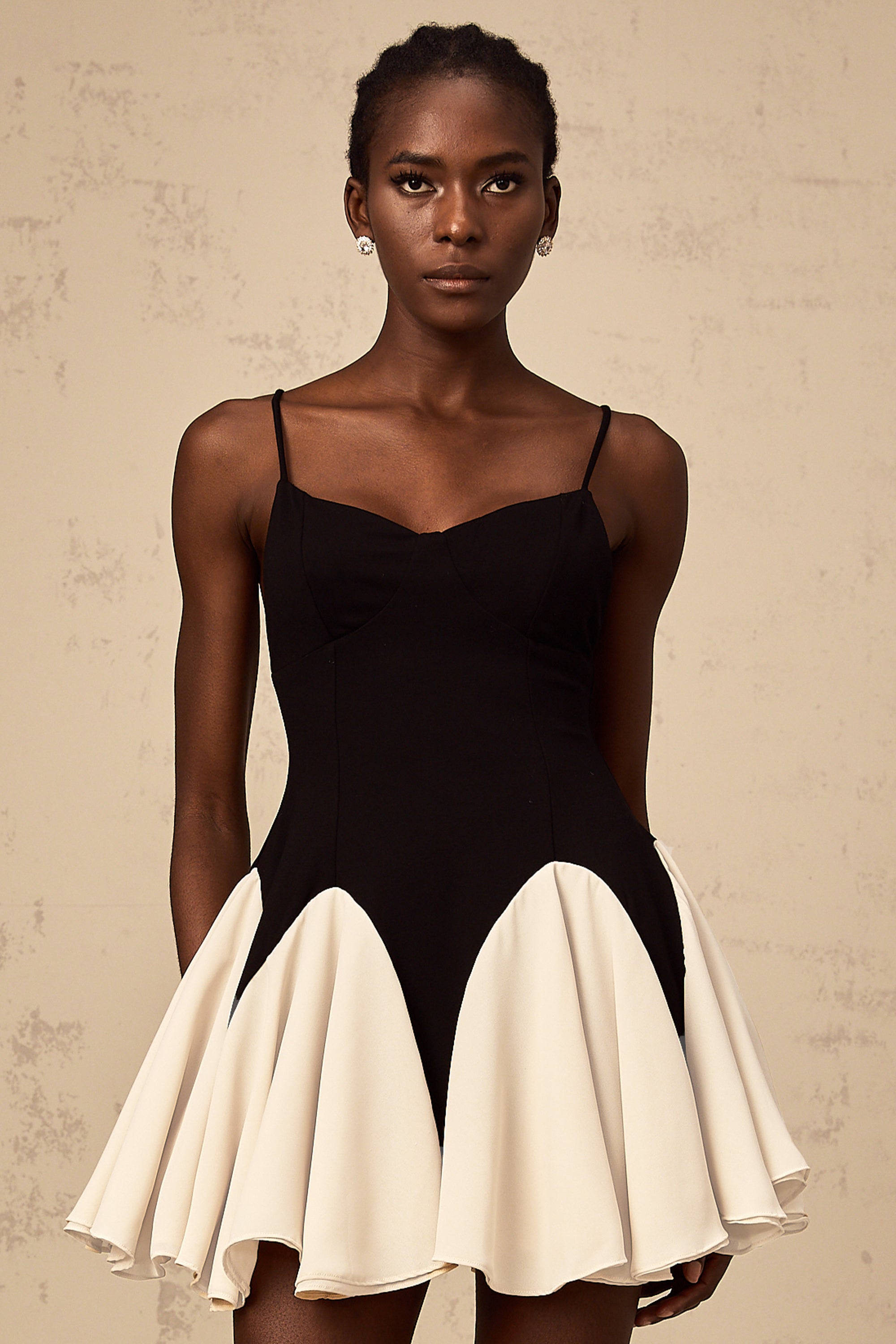 Justine color-blocked godet pleated mini dress