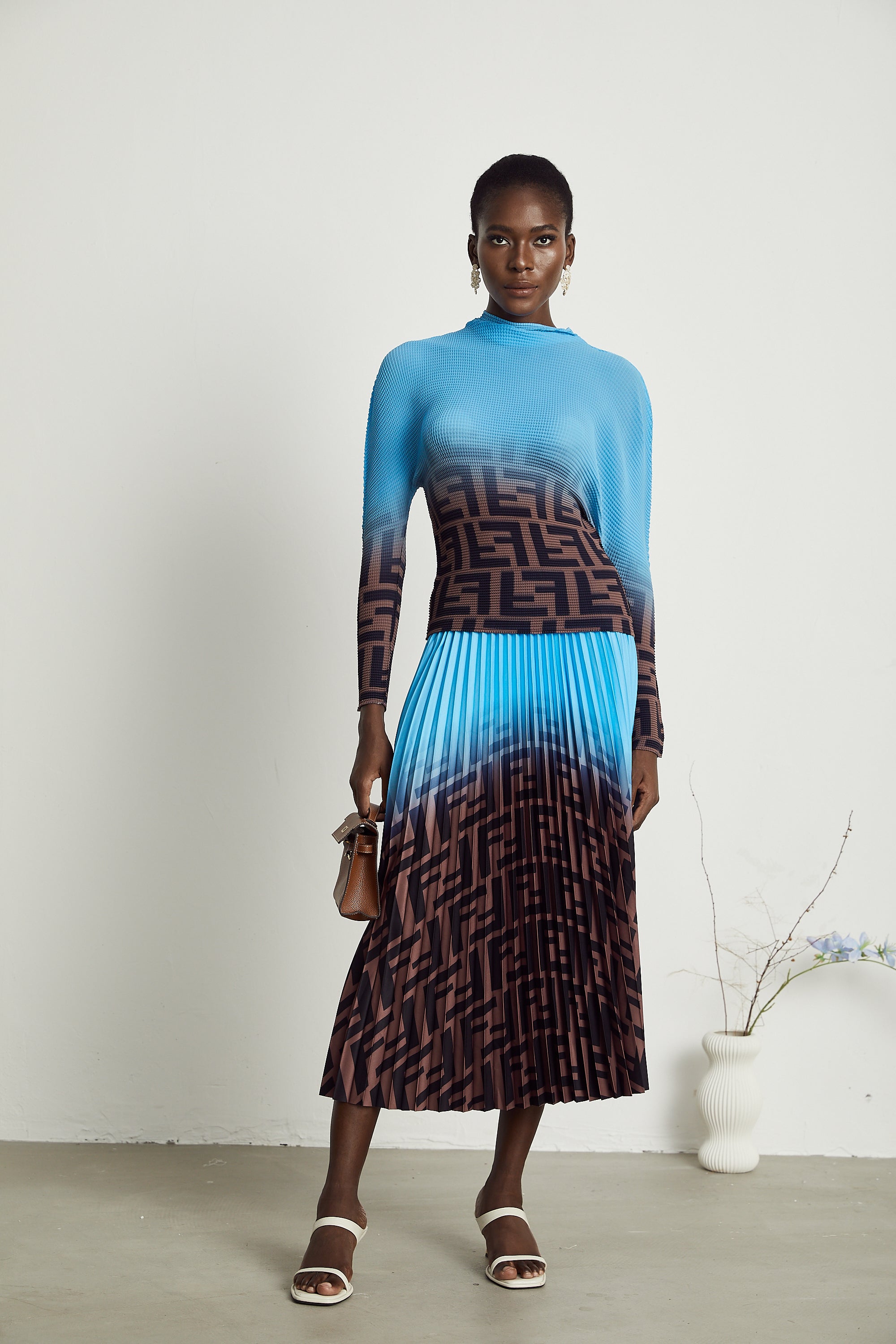 Passendes Set aus Plissee-Oberteil und Rock im Farbblockdesign Désirée