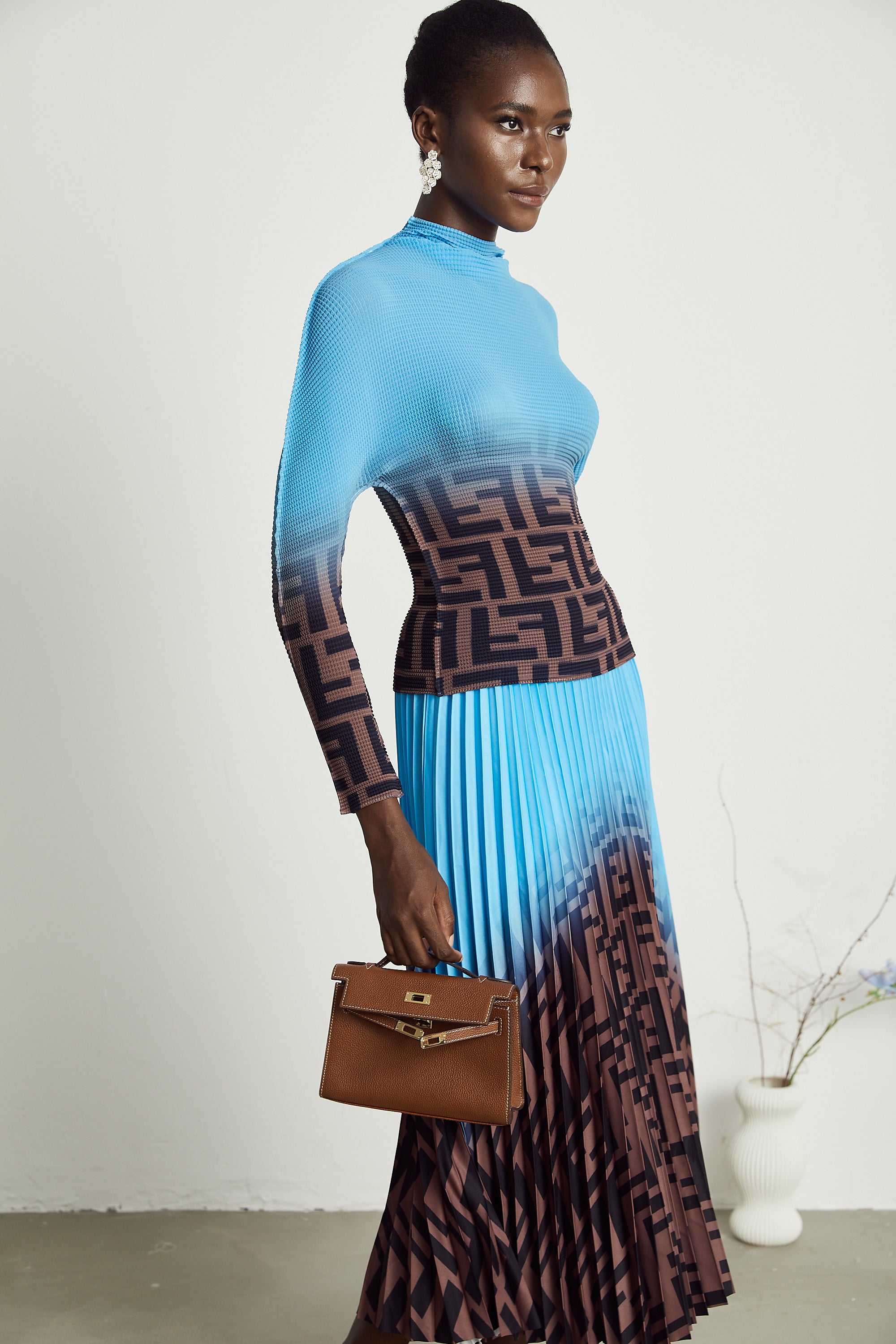 Passendes Set aus Plissee-Oberteil und Rock im Farbblockdesign Désirée