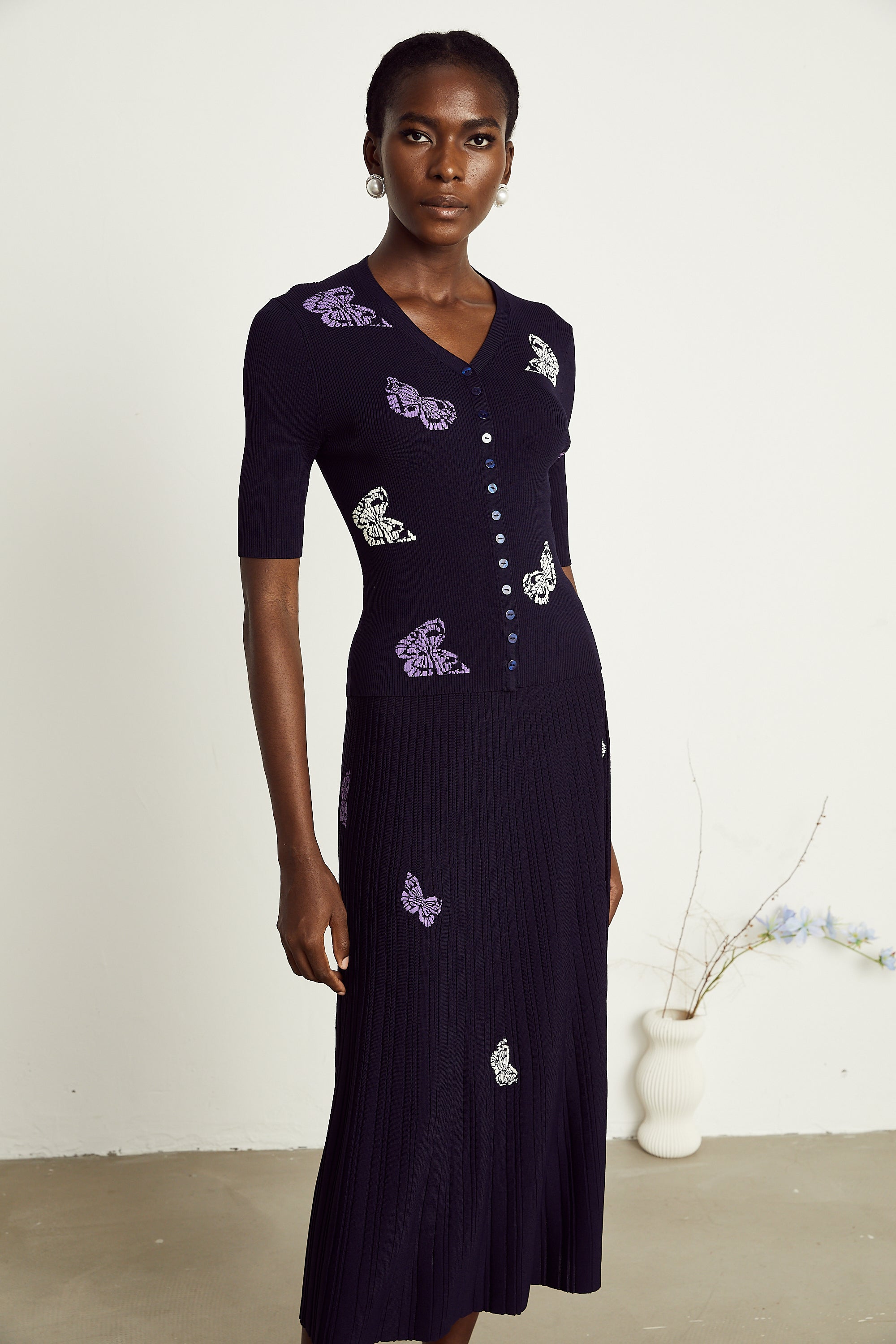 Delphine – Passendes Set aus Oberteil und Rock aus Rippstrick mit Schmetterlingsmotiv