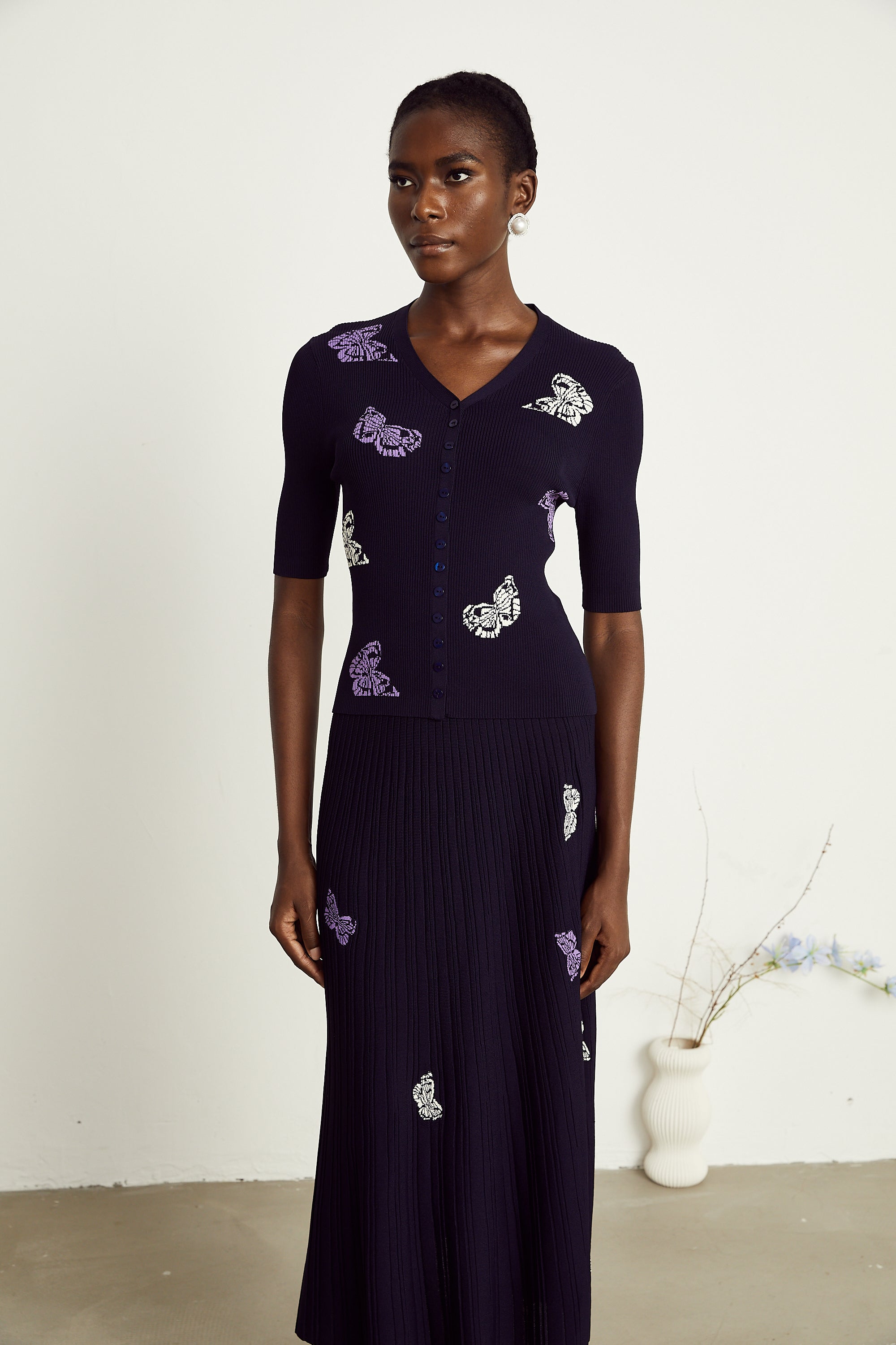 Delphine – Passendes Set aus Oberteil und Rock aus Rippstrick mit Schmetterlingsmotiv