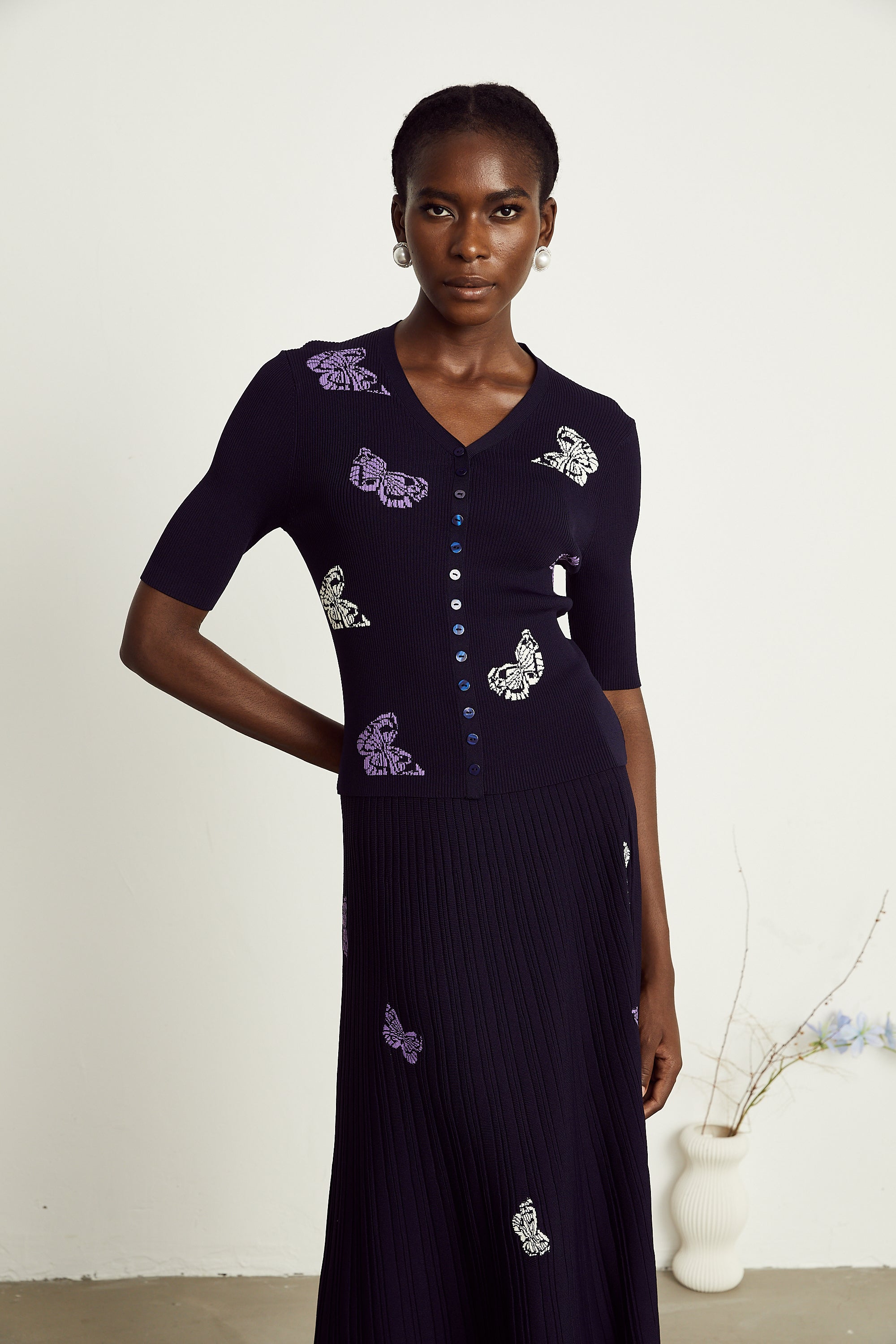 Delphine – Passendes Set aus Oberteil und Rock aus Rippstrick mit Schmetterlingsmotiv