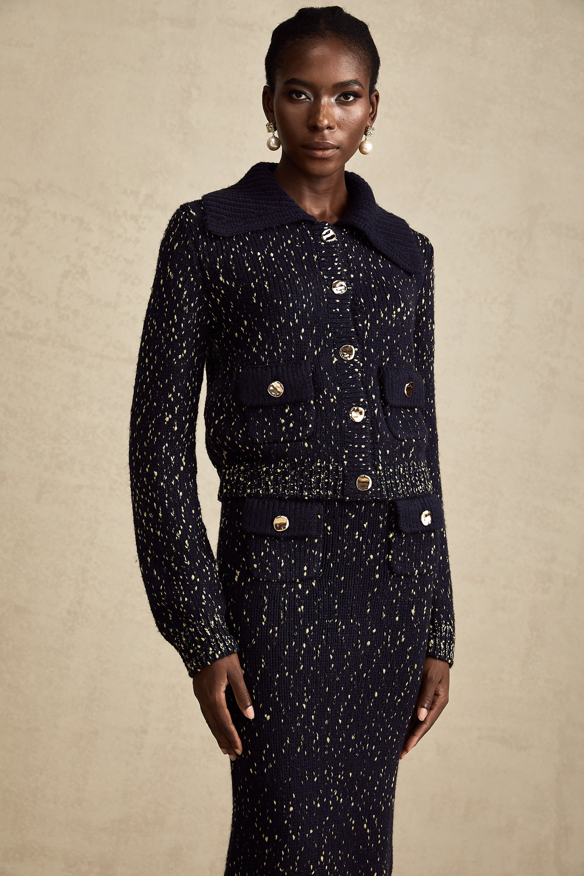 طقم سترة وتنورة كروشيه باللون الأزرق الداكن من Claudine