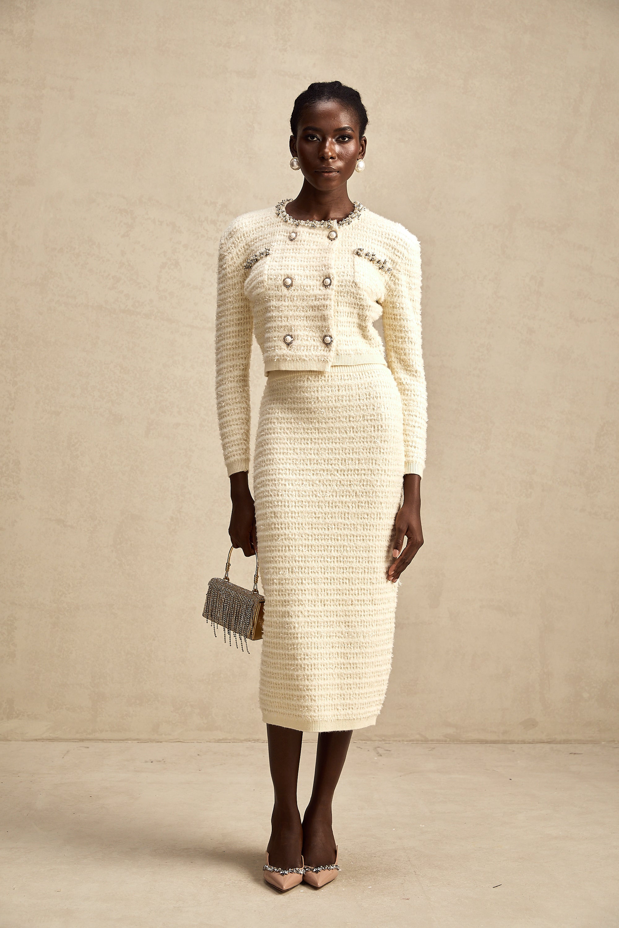 طقم تنورة وكارديجان محبوكان مزخرفان من مجموعة Justine