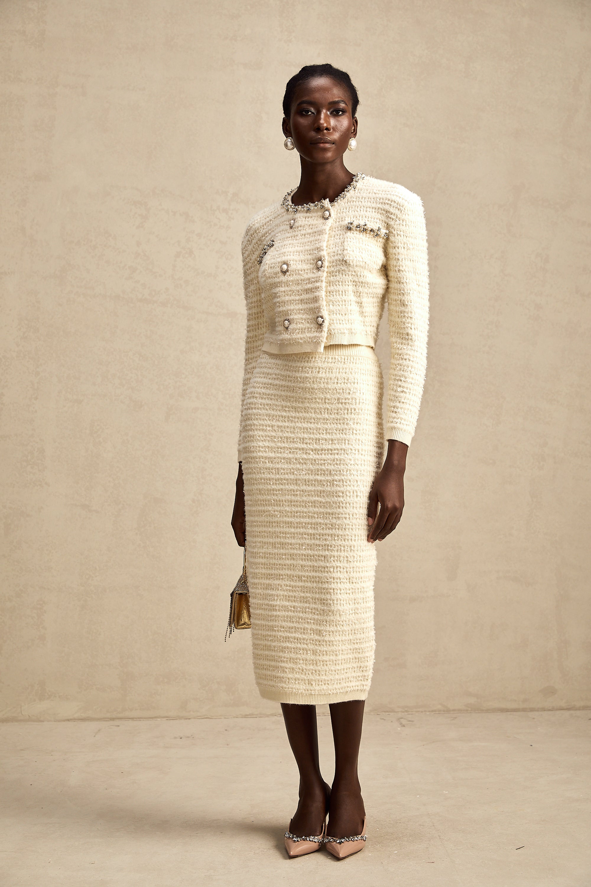 طقم تنورة وكارديجان محبوكان مزخرفان من مجموعة Justine