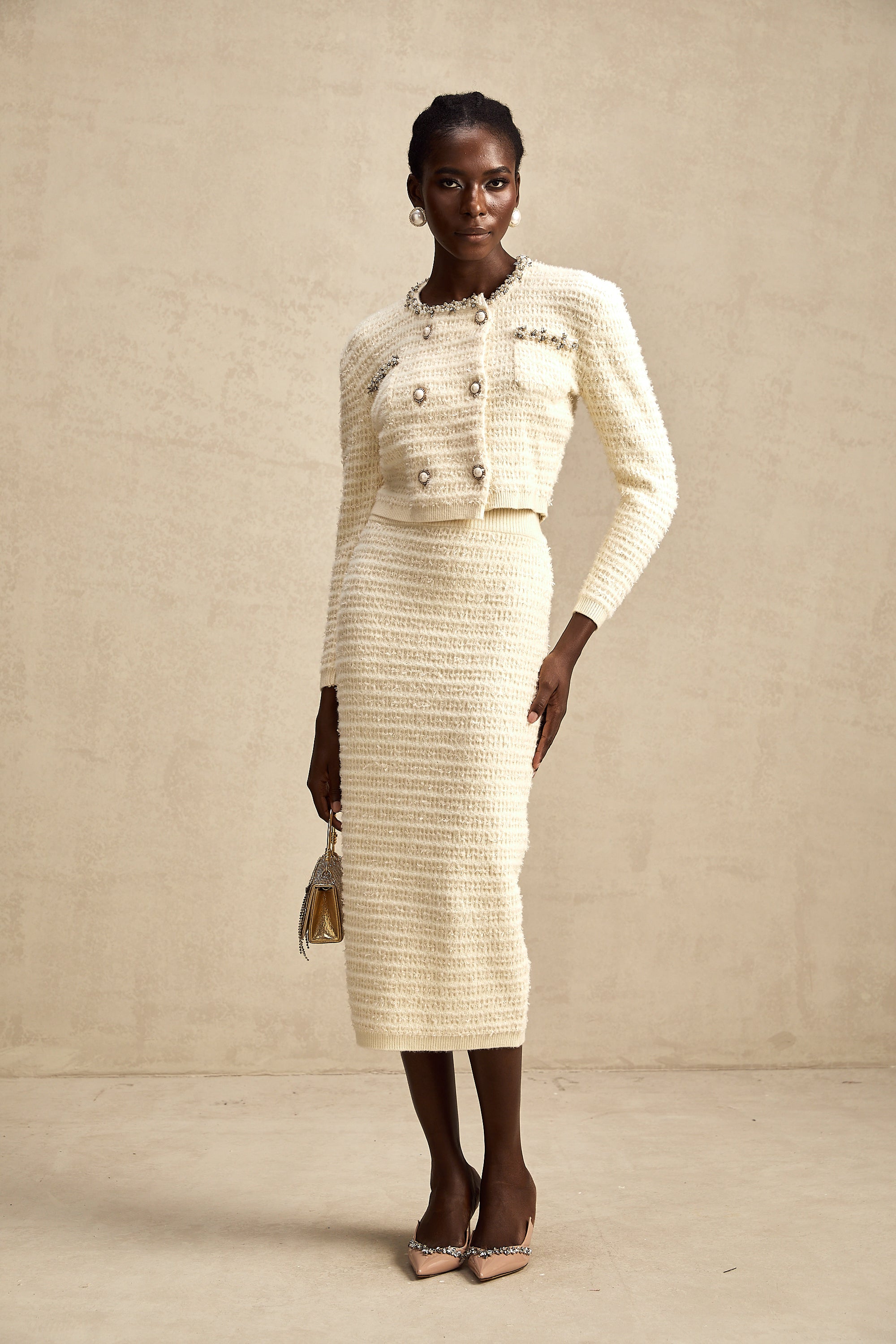 طقم تنورة وكارديجان محبوكان مزخرفان من مجموعة Justine