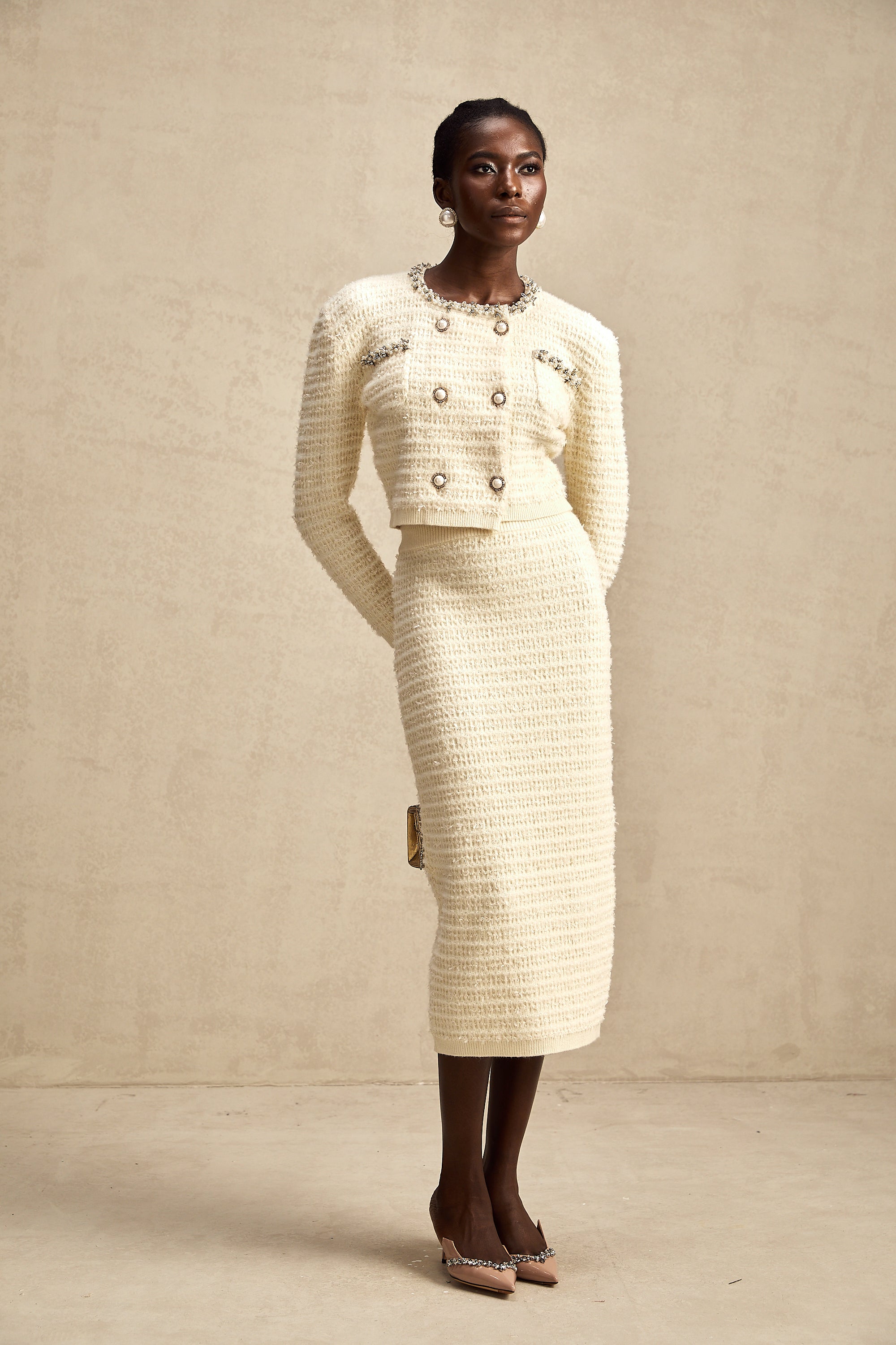 طقم تنورة وكارديجان محبوكان مزخرفان من مجموعة Justine