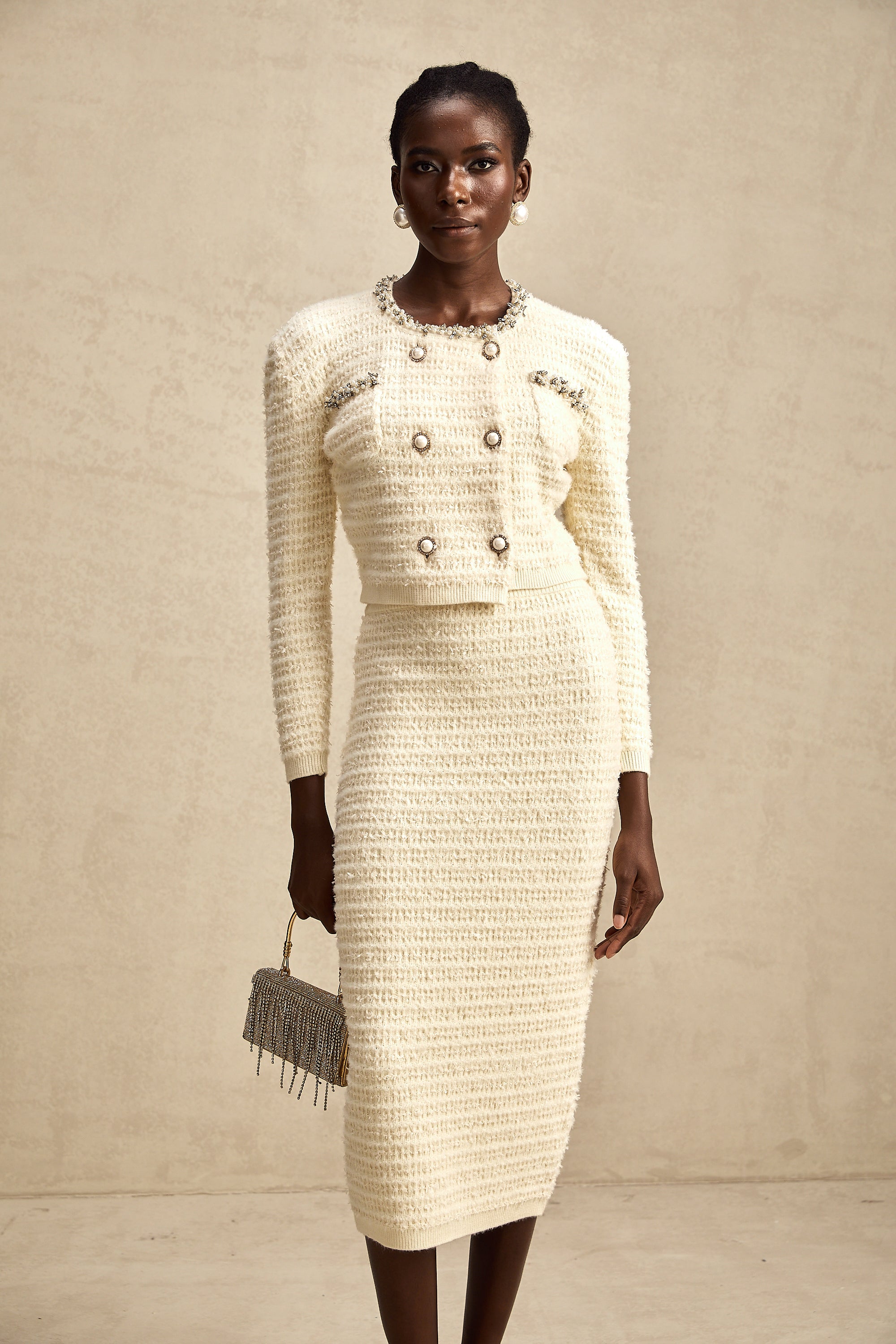 طقم تنورة وكارديجان محبوكان مزخرفان من مجموعة Justine