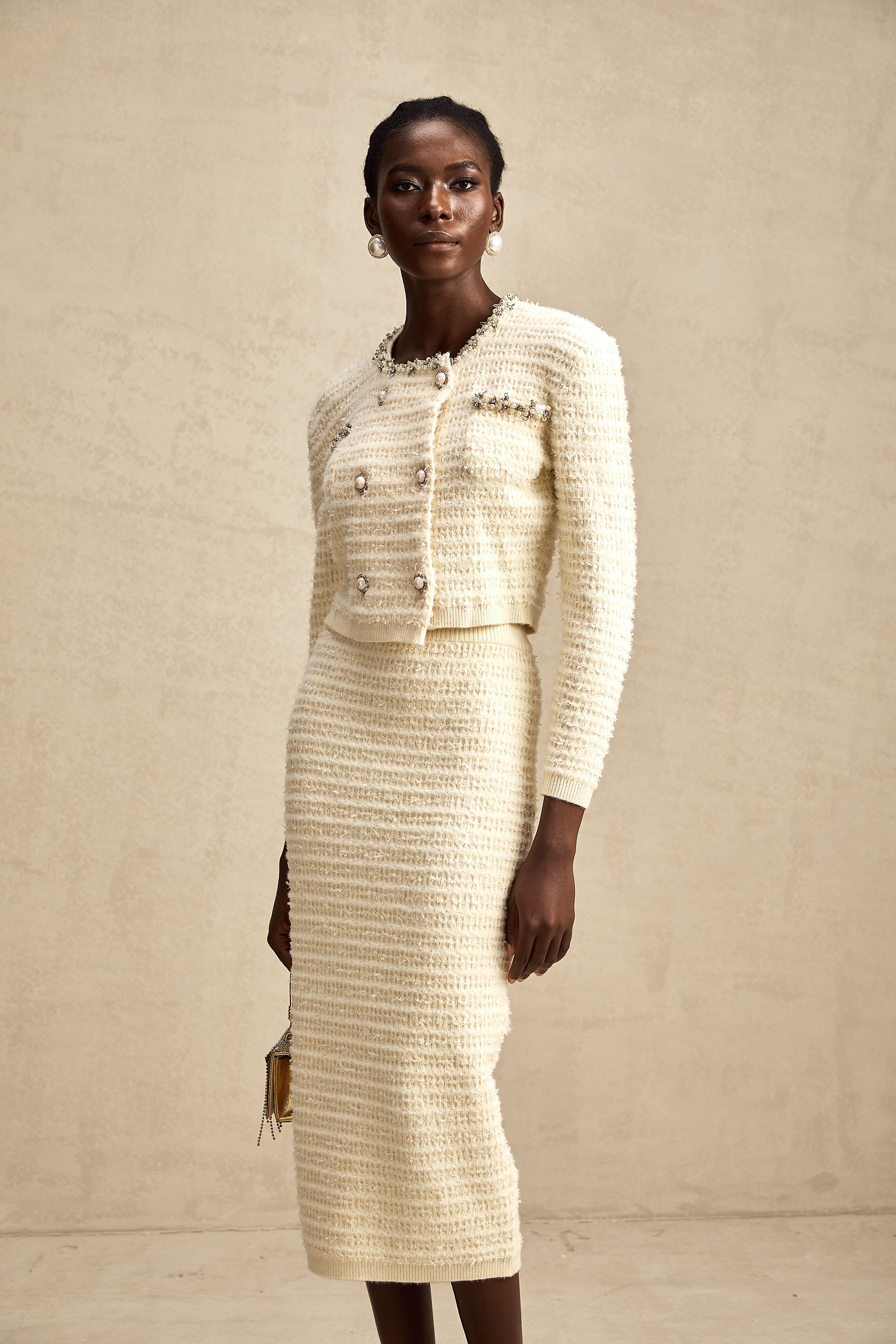 طقم تنورة وكارديجان محبوكان مزخرفان من مجموعة Justine