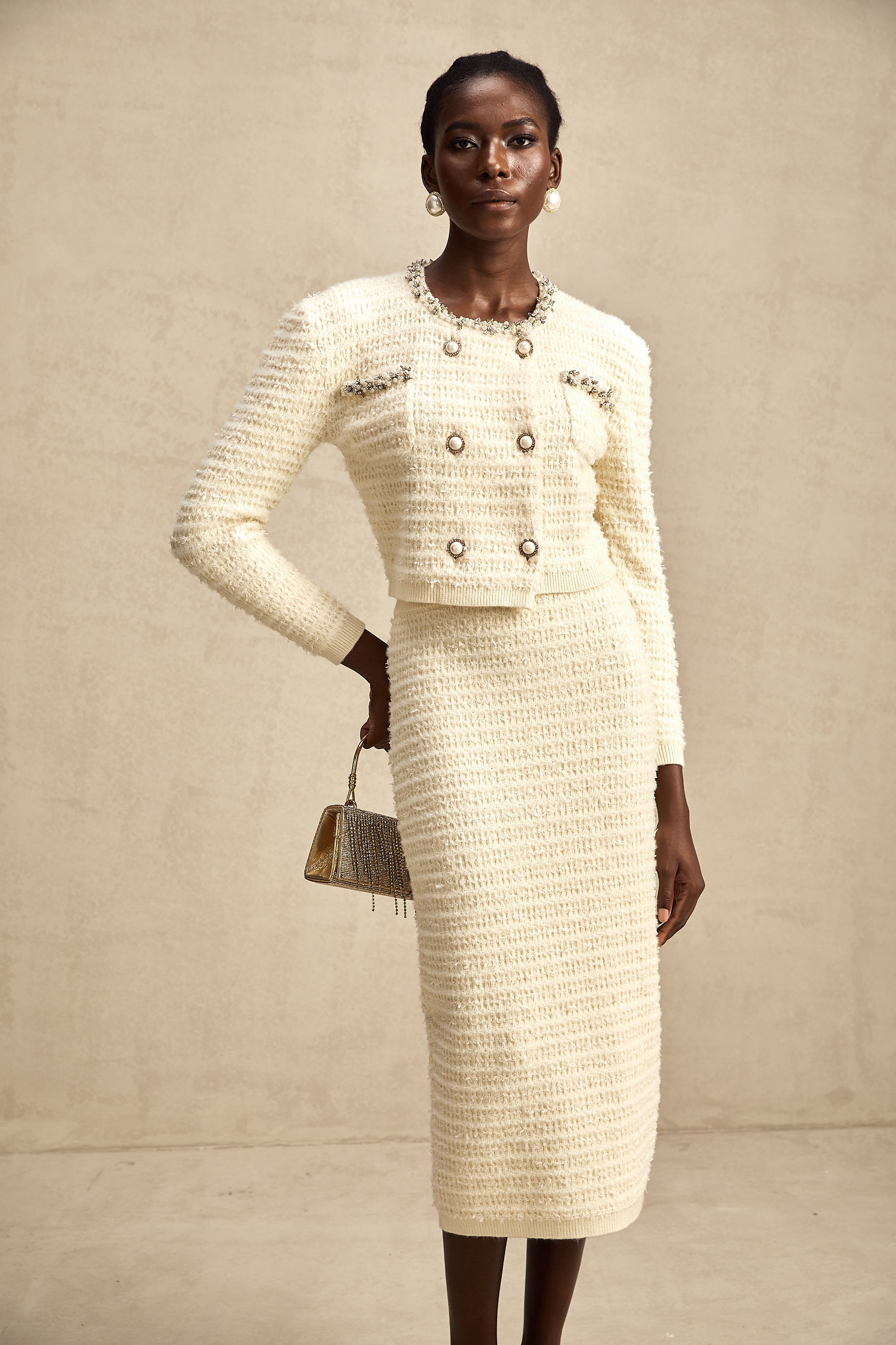 طقم تنورة وكارديجان محبوكان مزخرفان من مجموعة Justine