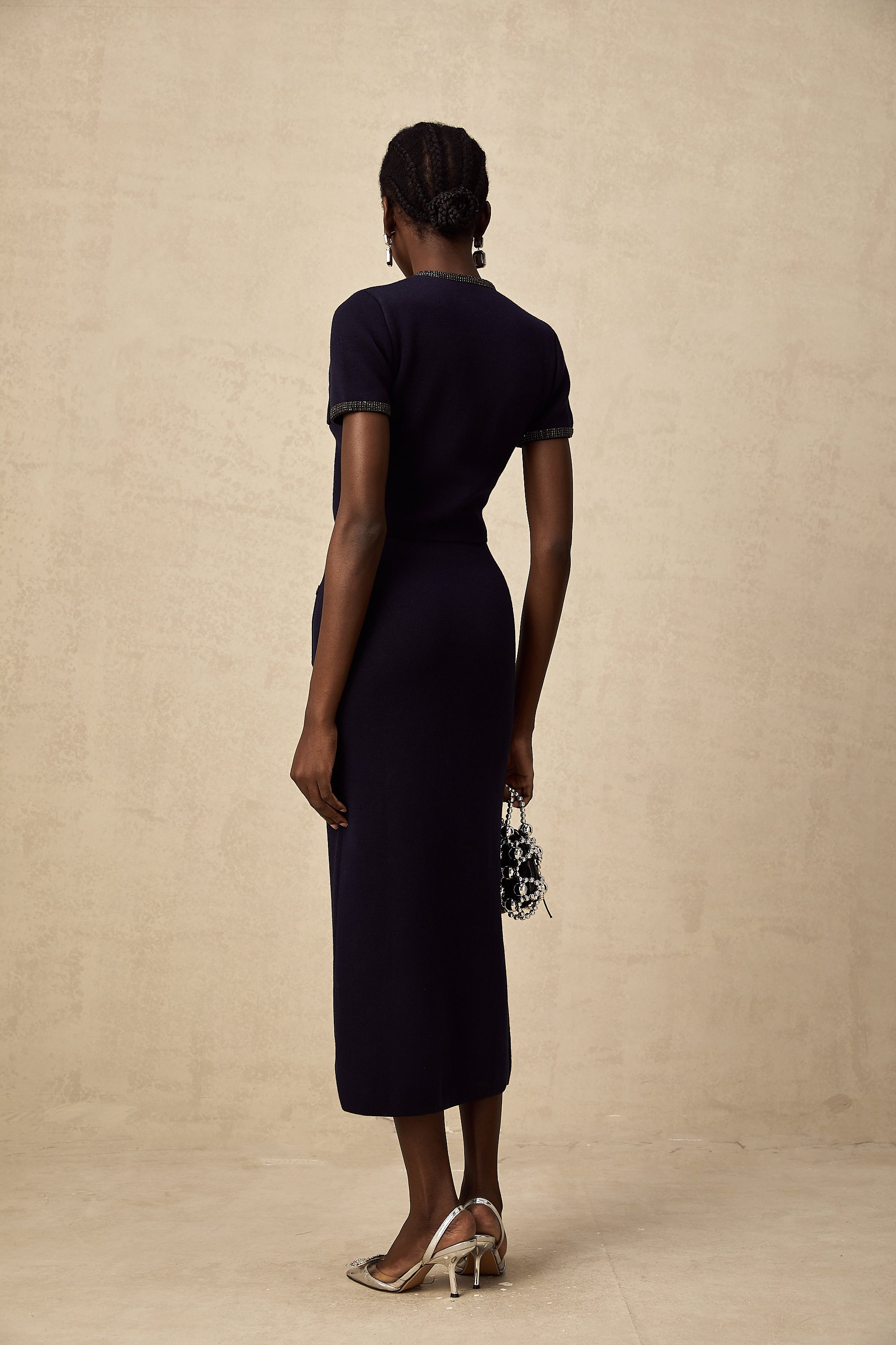 طقم Aïda المزين بقماش محبوك مضلع مكون من بلوزة وتنورة متناسقة