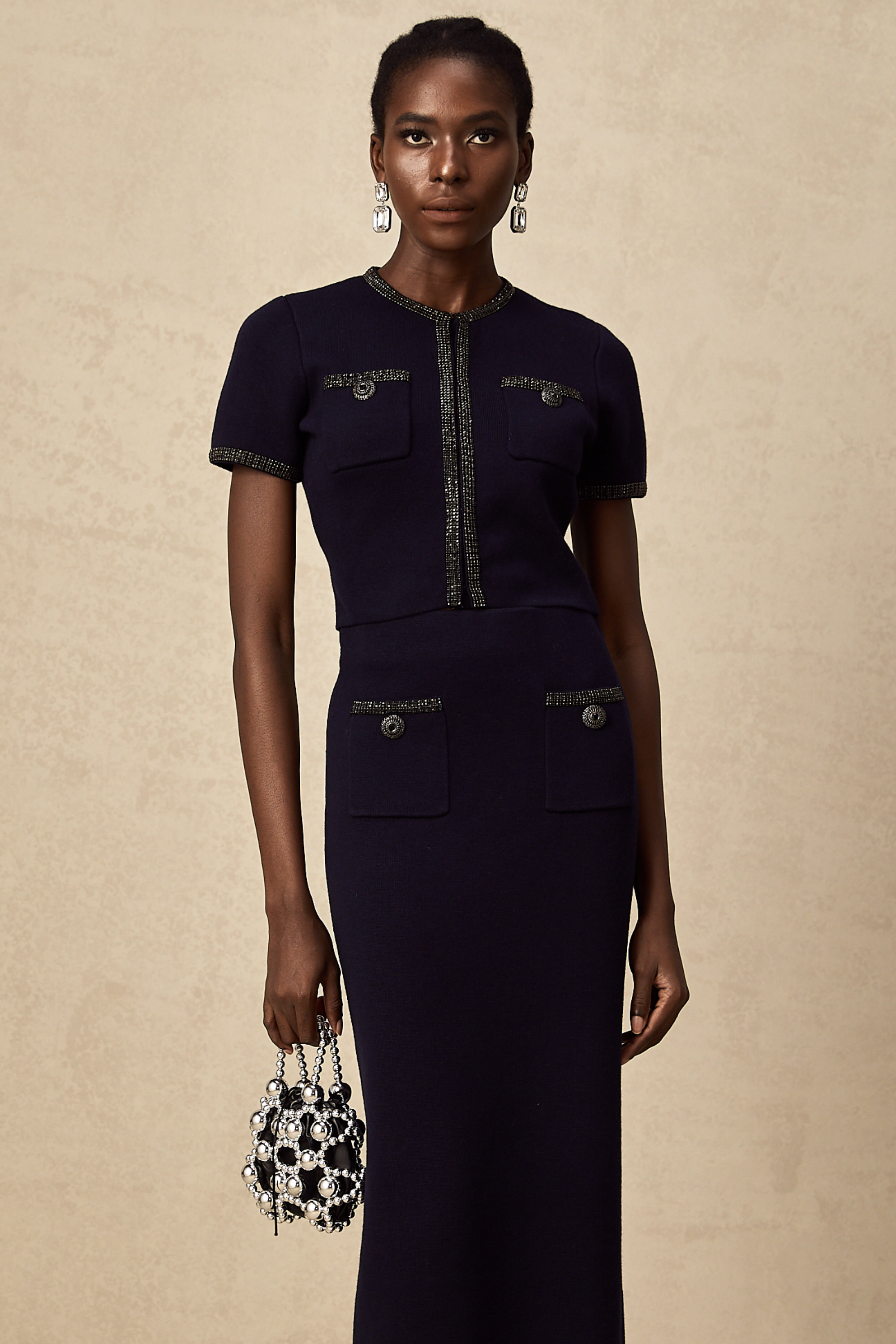 طقم Aïda المزين بقماش محبوك مضلع مكون من بلوزة وتنورة متناسقة