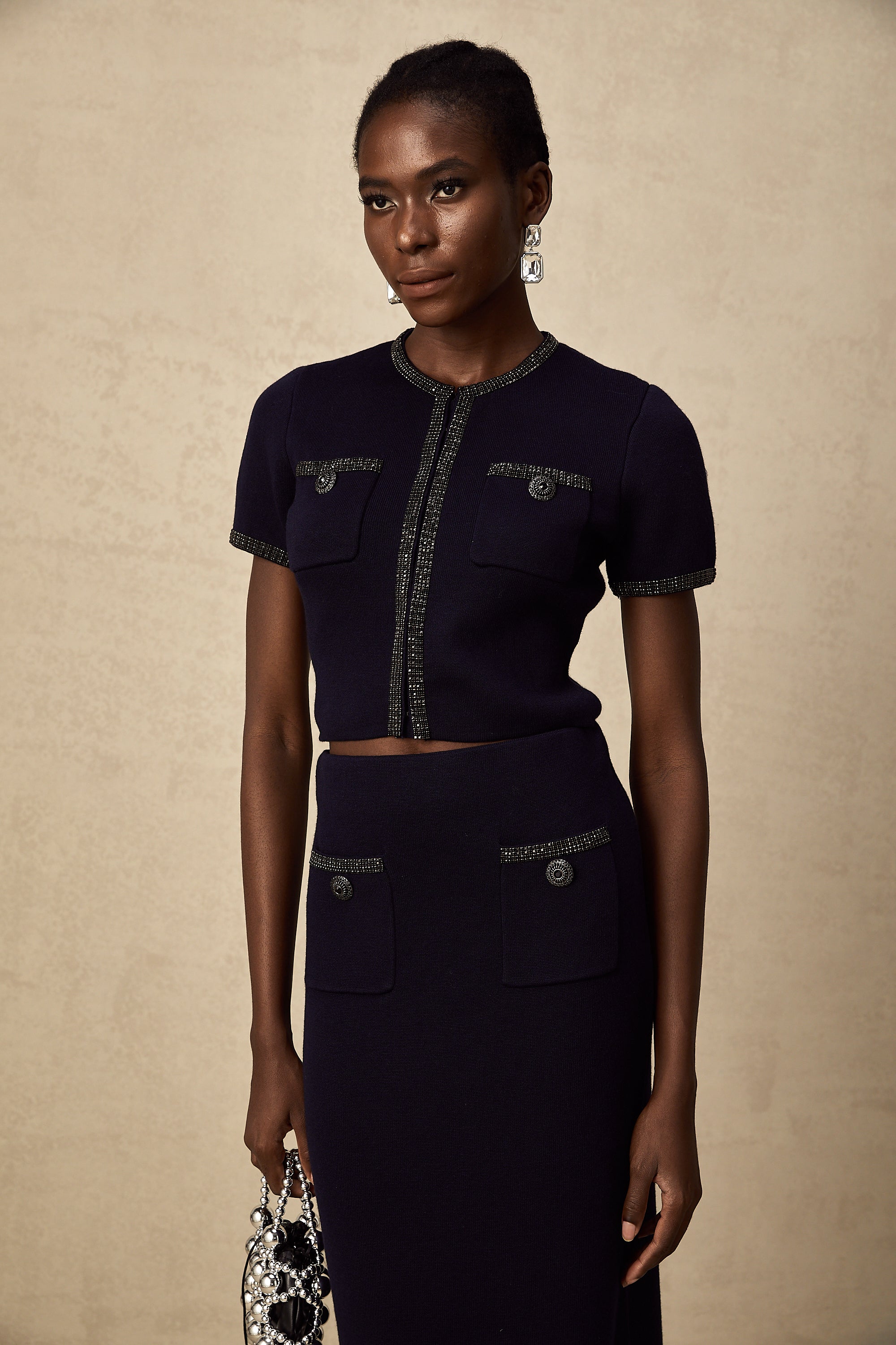 طقم Aïda المزين بقماش محبوك مضلع مكون من بلوزة وتنورة متناسقة