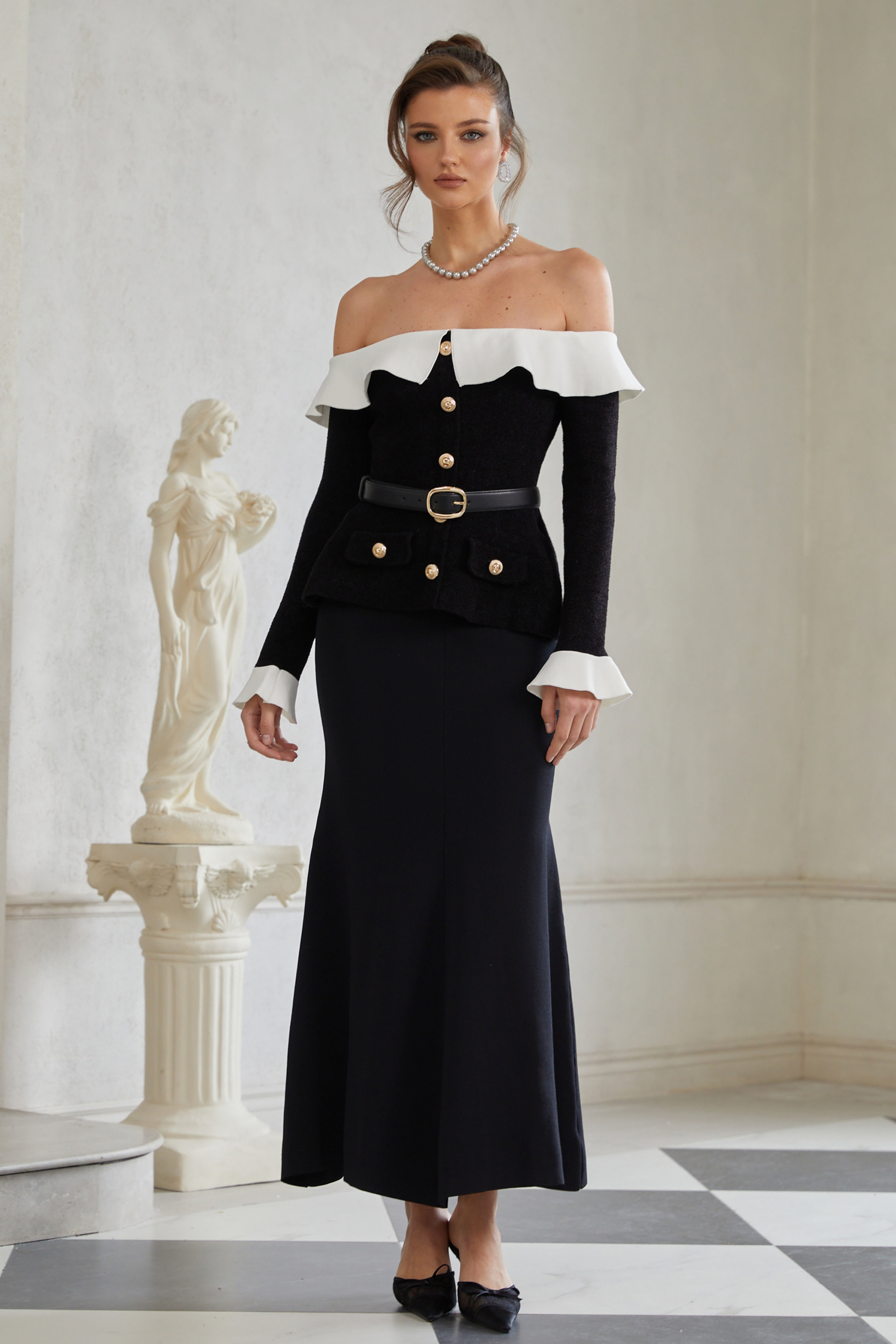 Giorgia Schwarzes Maxikleid aus Strick mit Rüschenbesatz