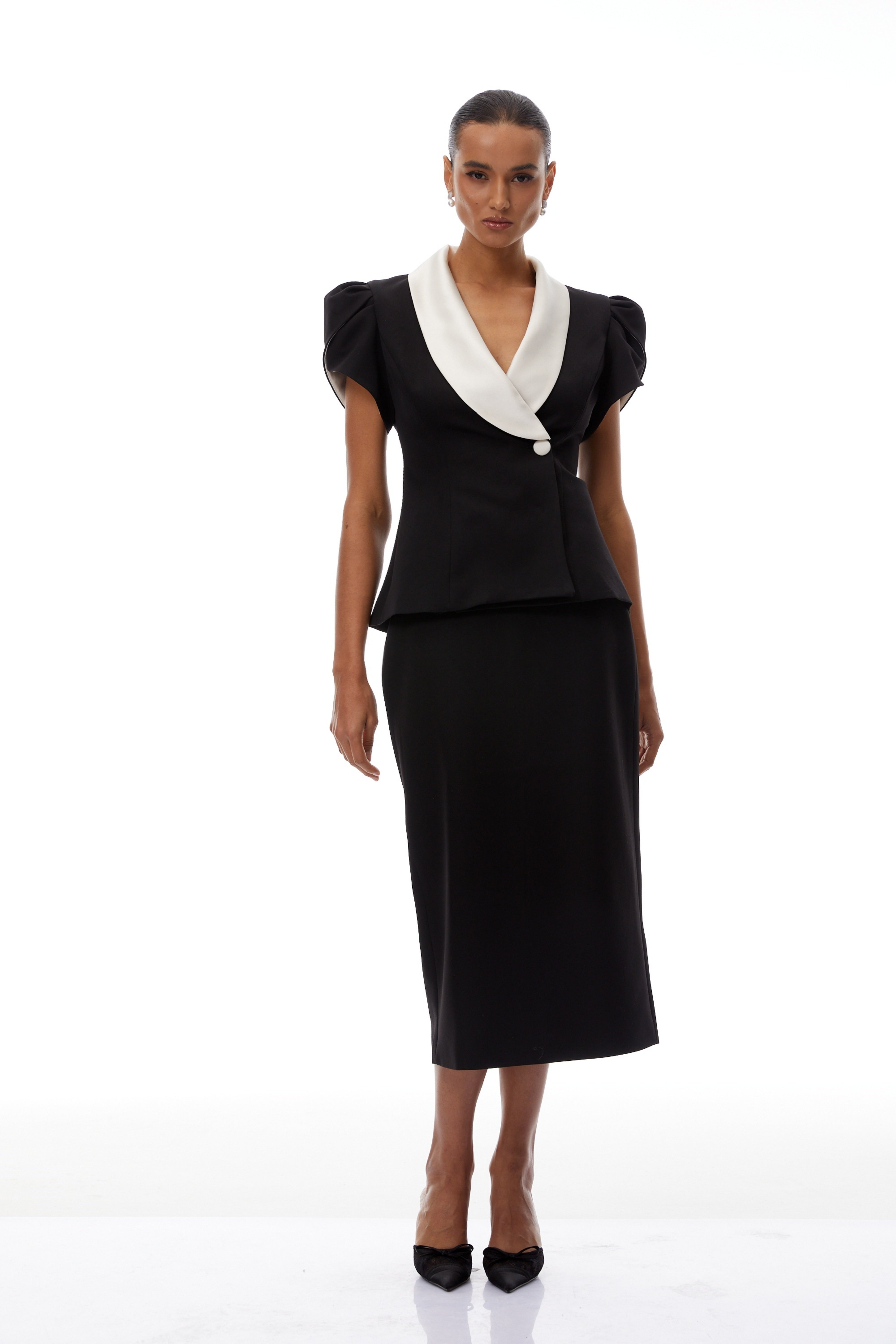 طقم بلوزة و تنورة ضيقة من أشاريا بتصميم ألوان متداخلة