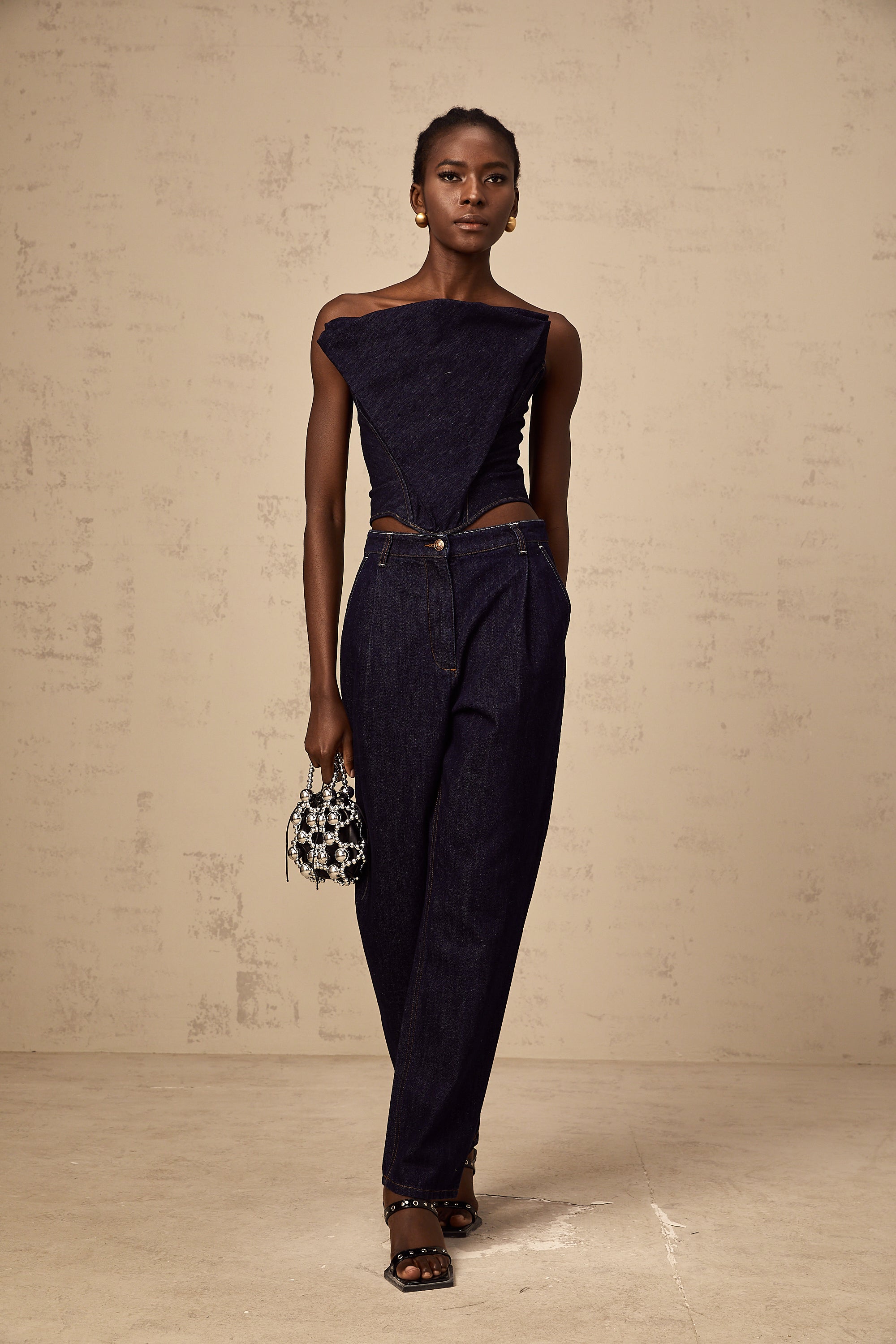 بنطلون جينز داناي أزرق بخصر مرتفع وتفاصيل مطوية