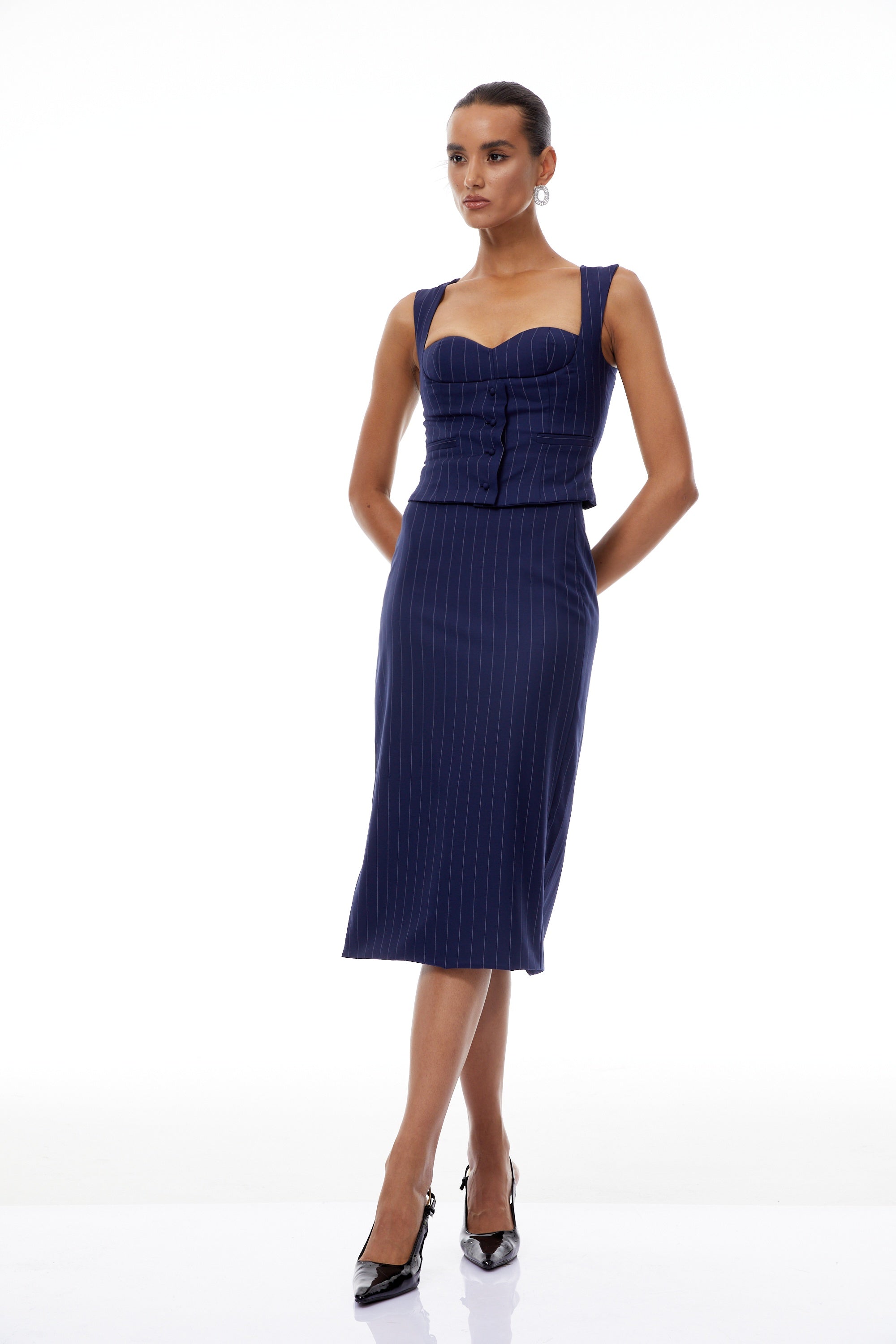 طقم أوريان بلوزة وتنورة مخططة باللون الأزرق الداكن