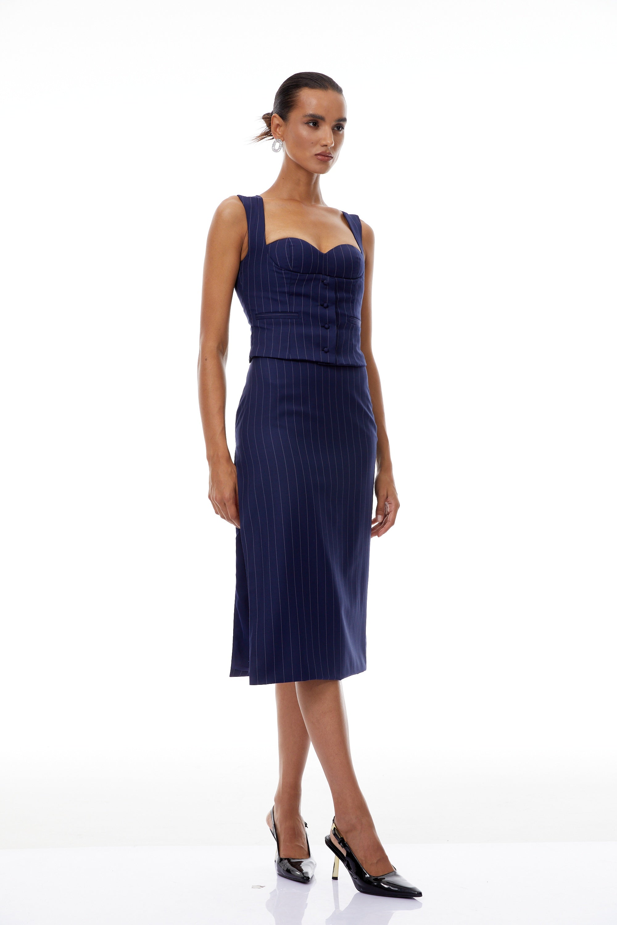 طقم أوريان بلوزة وتنورة مخططة باللون الأزرق الداكن