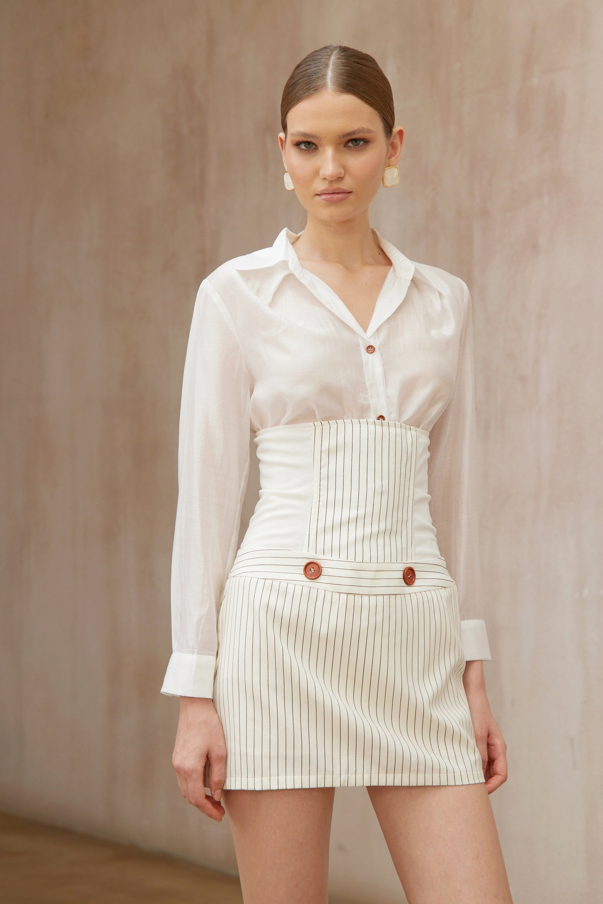 طقم قميص وتنورة مخطط أبيض من Eléonore