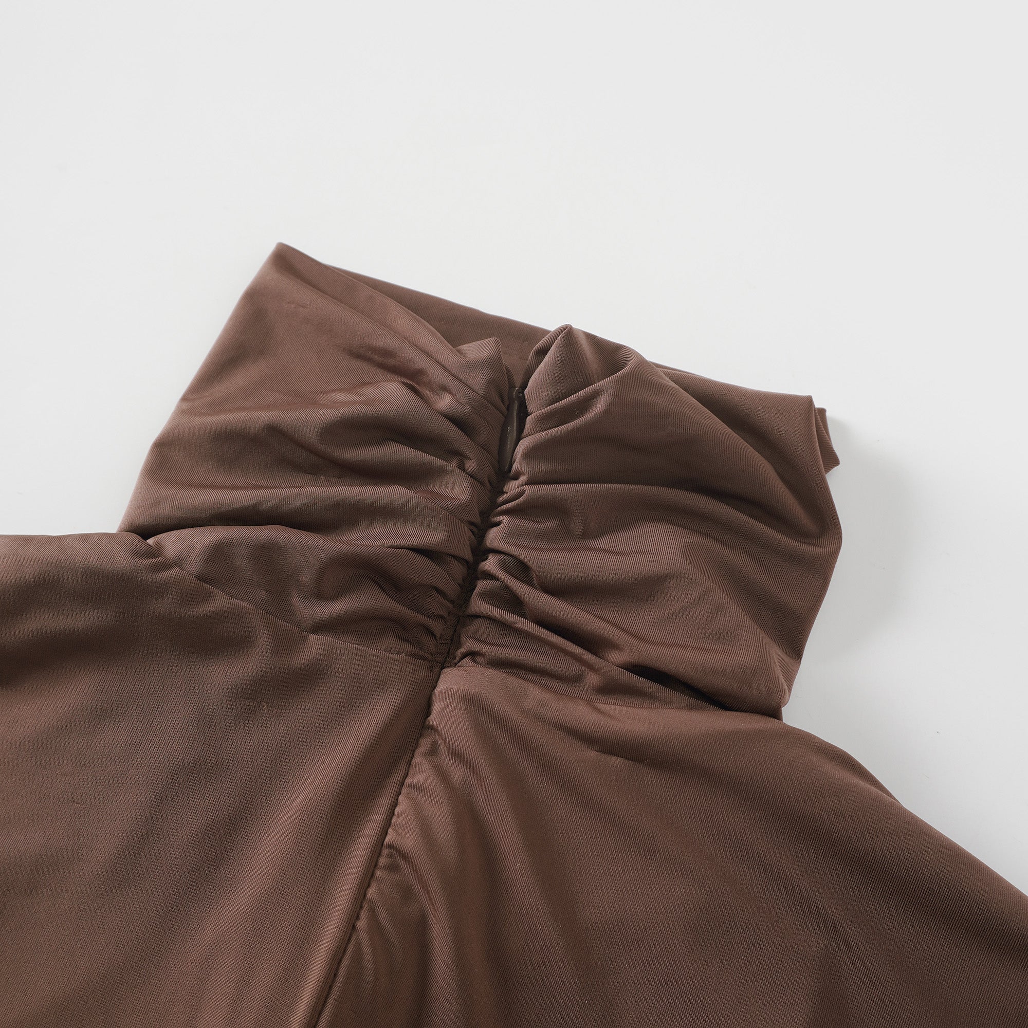Brown turtleneck long-sleeved midi dress with a ruched skirt