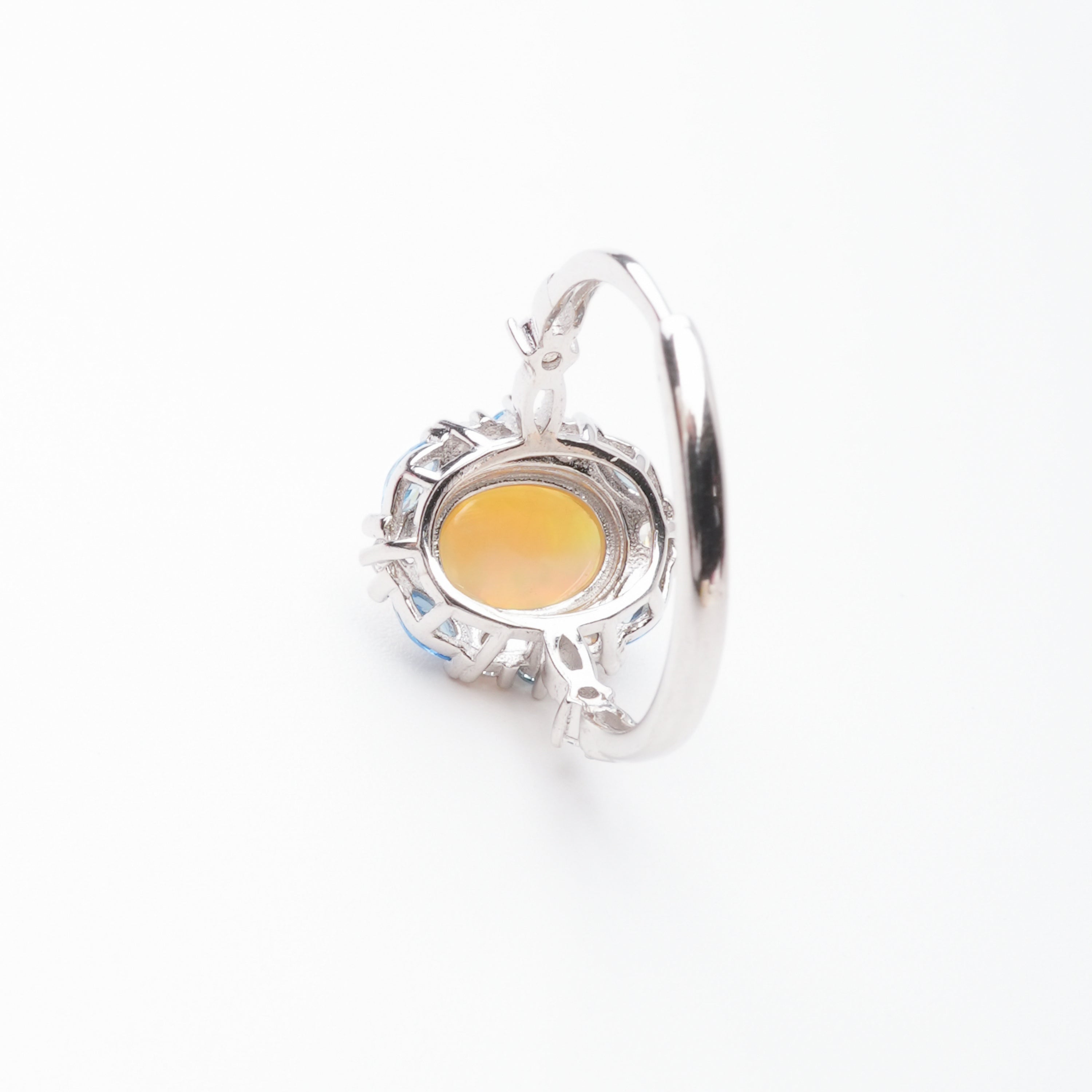 Christine Yellow Opal Oval Cabochon Blue Halo Sterling Silver Ring