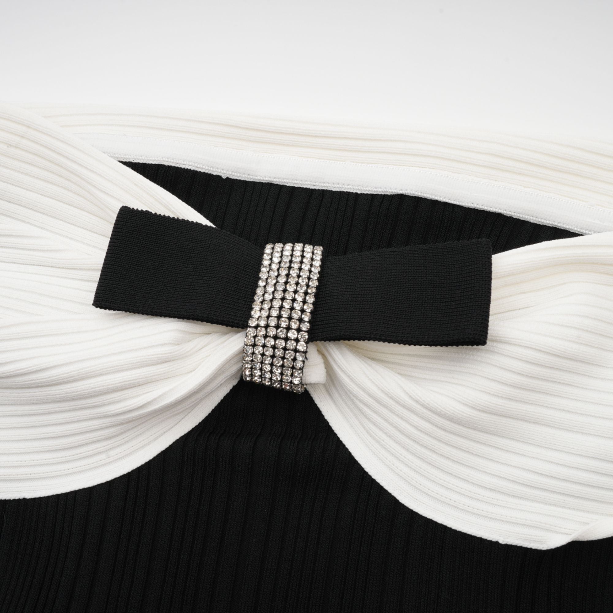 Angèle black off-shoulder knitted mini dress