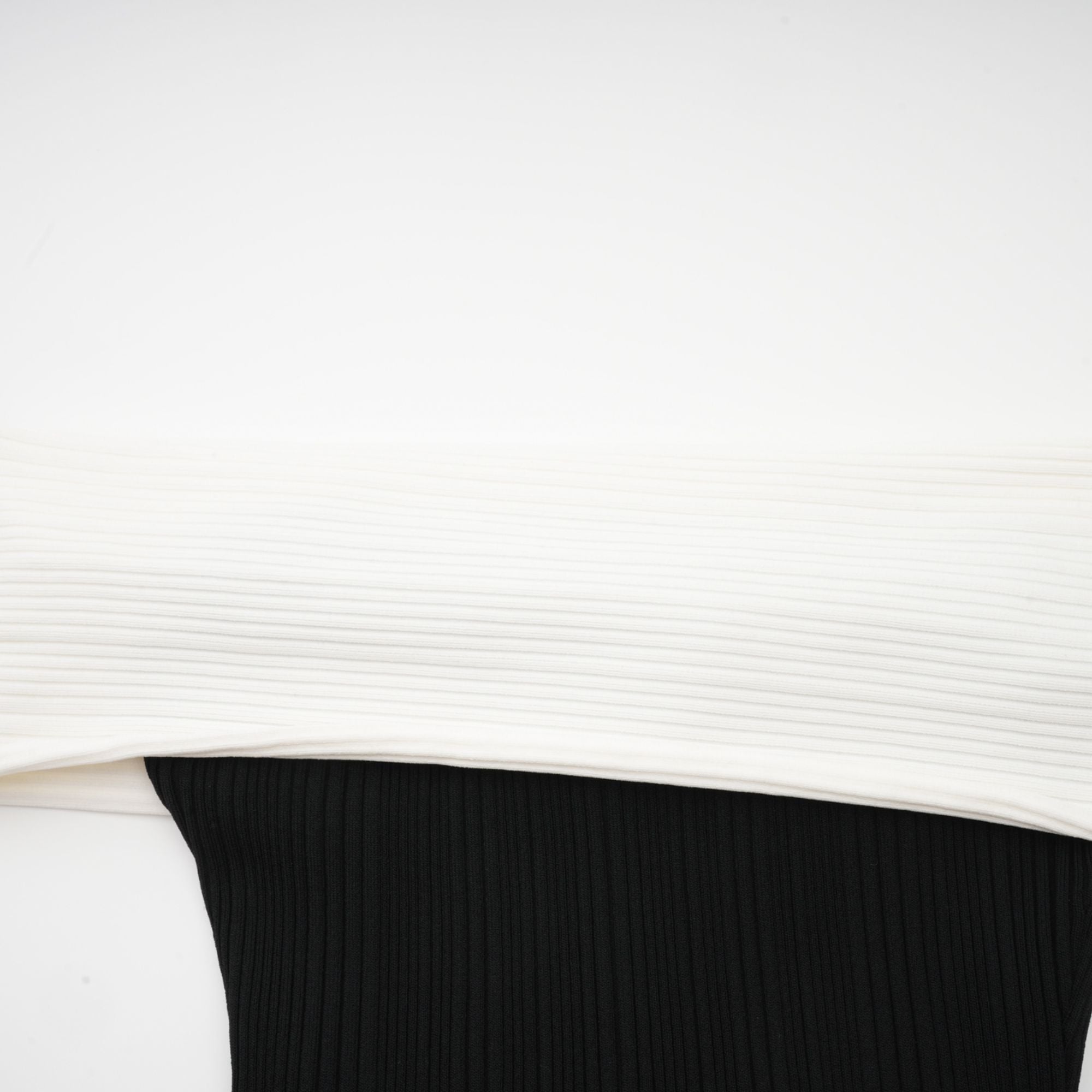 Angèle black off-shoulder knitted mini dress