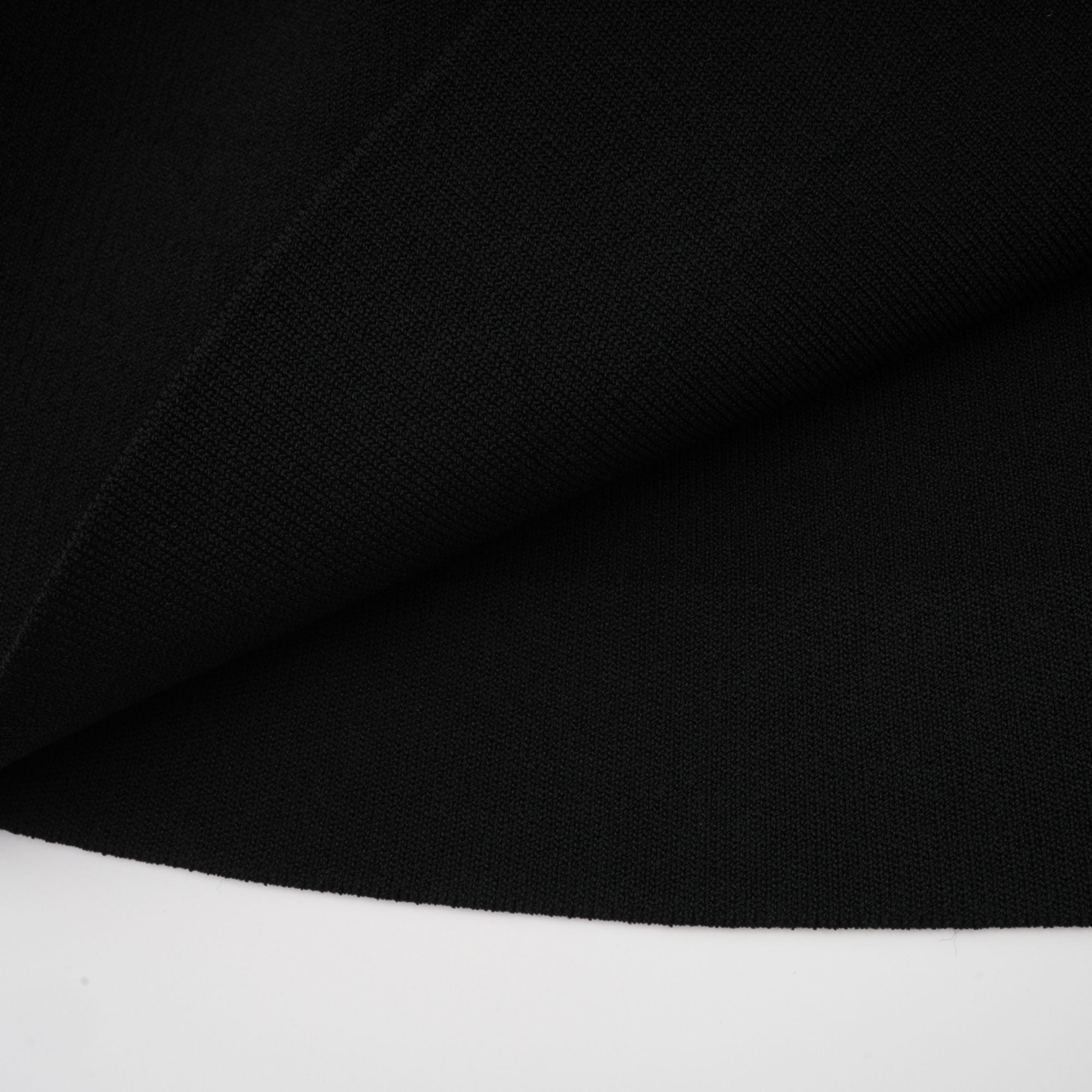 Angèle black off-shoulder knitted mini dress