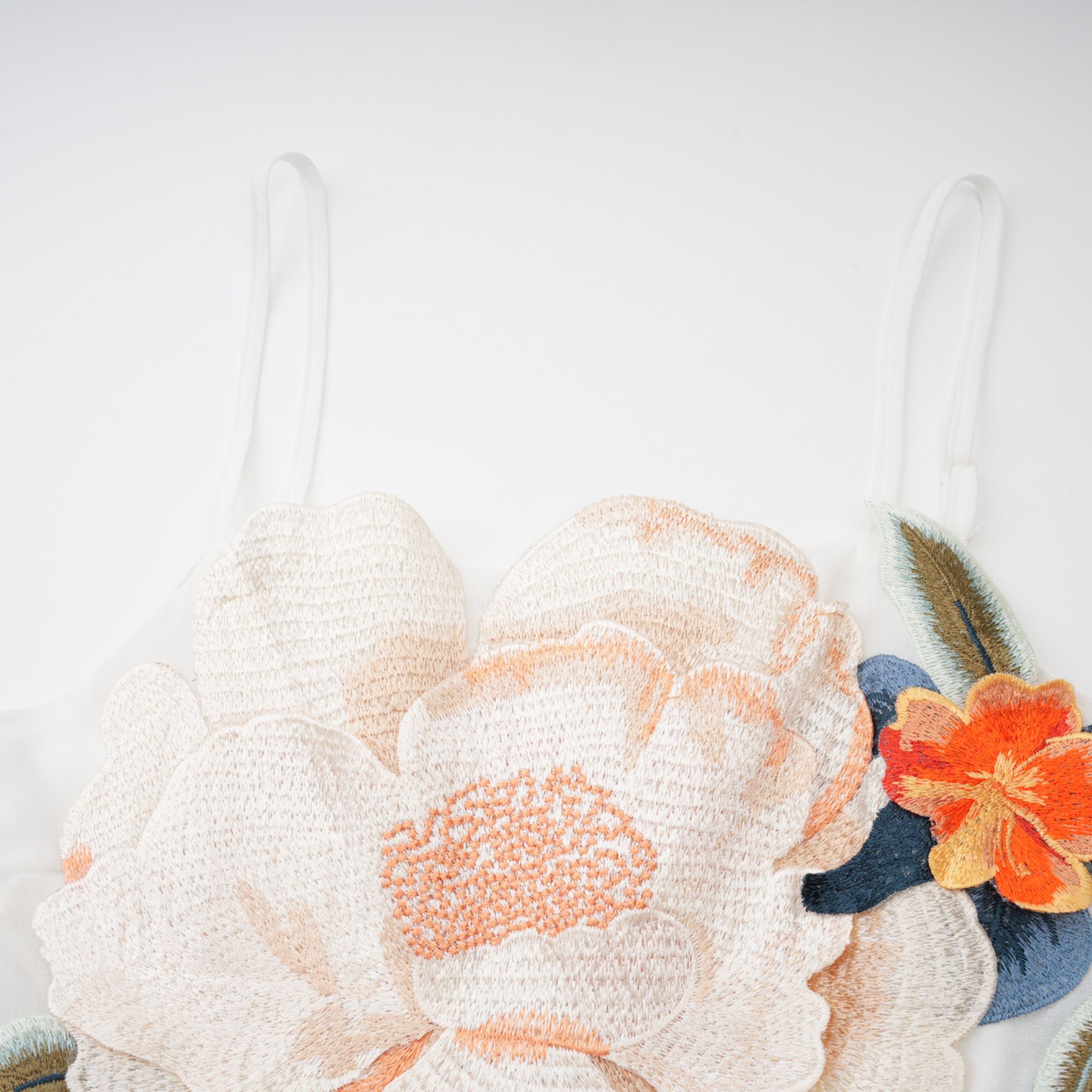 Josette floral-embroidered shirred maxi dress in White