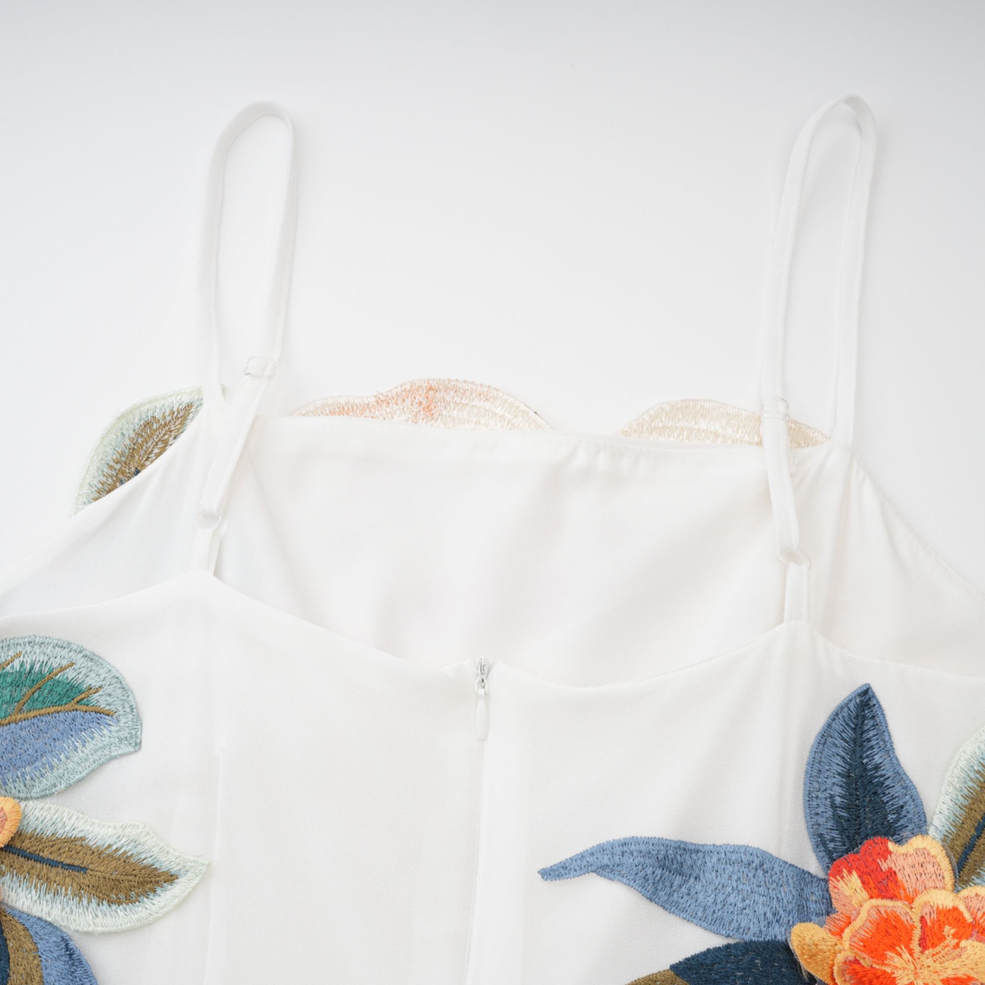 Josette floral-embroidered shirred maxi dress in White