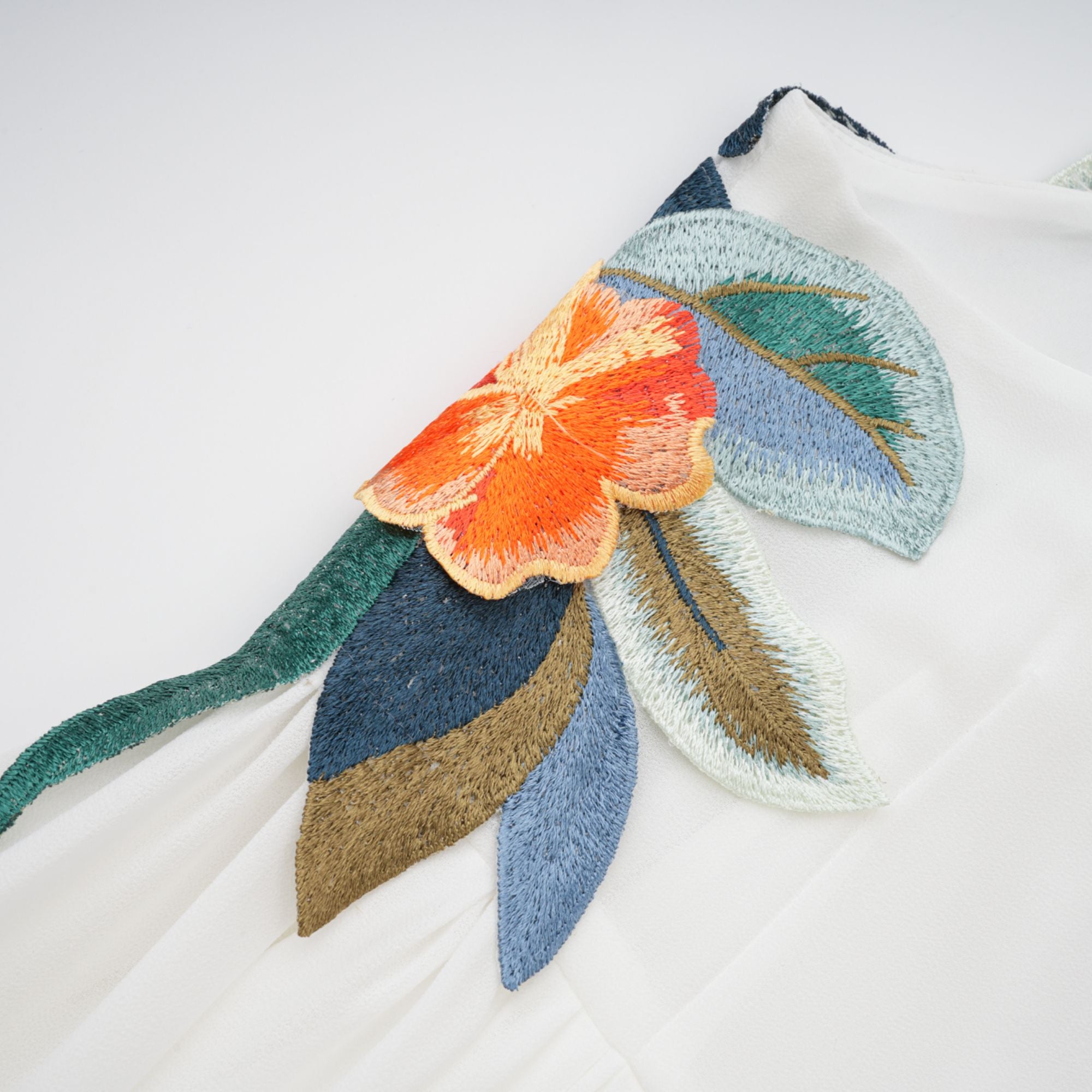 Josette floral-embroidered shirred maxi dress in White