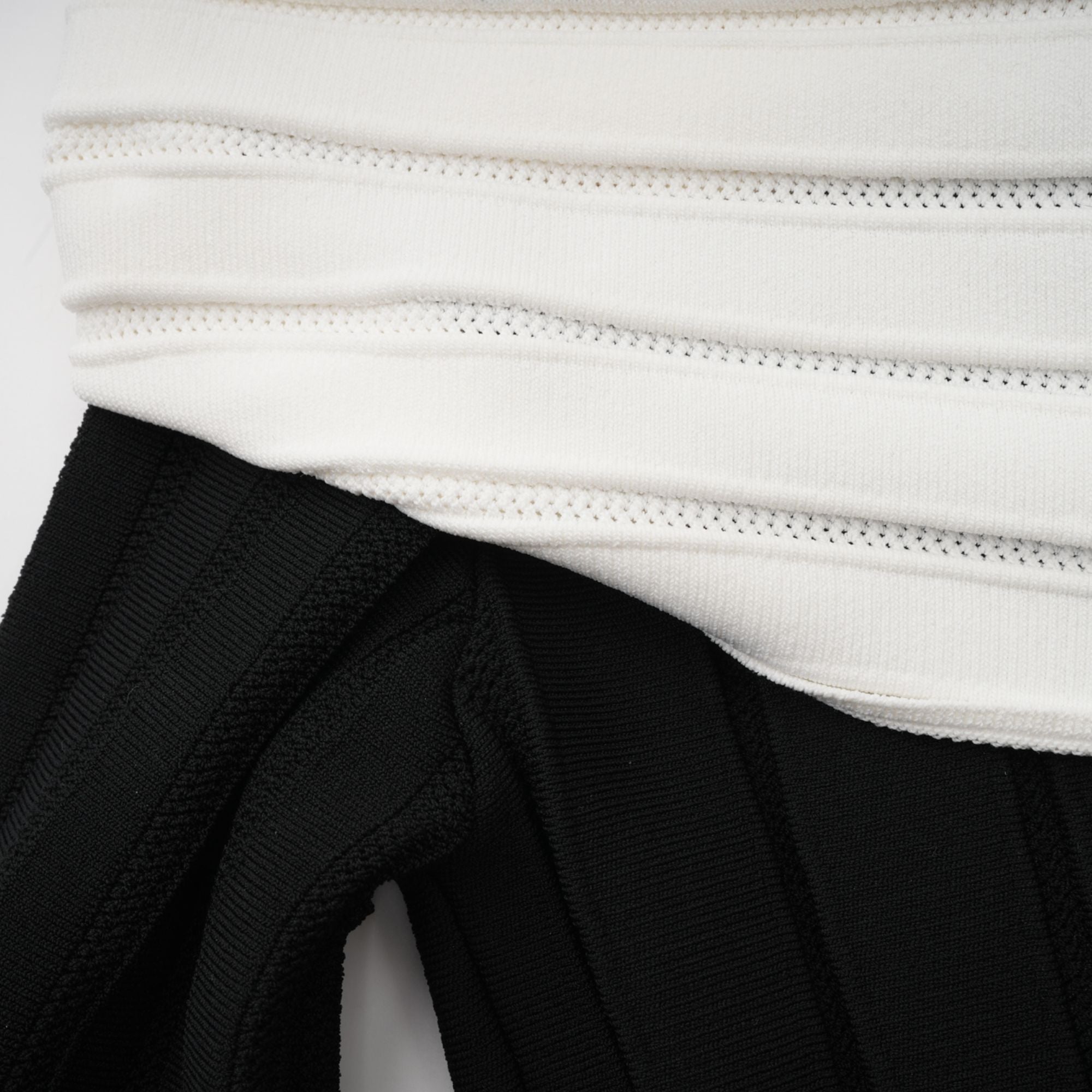 Justine black off-shoulder bow knit mini dress