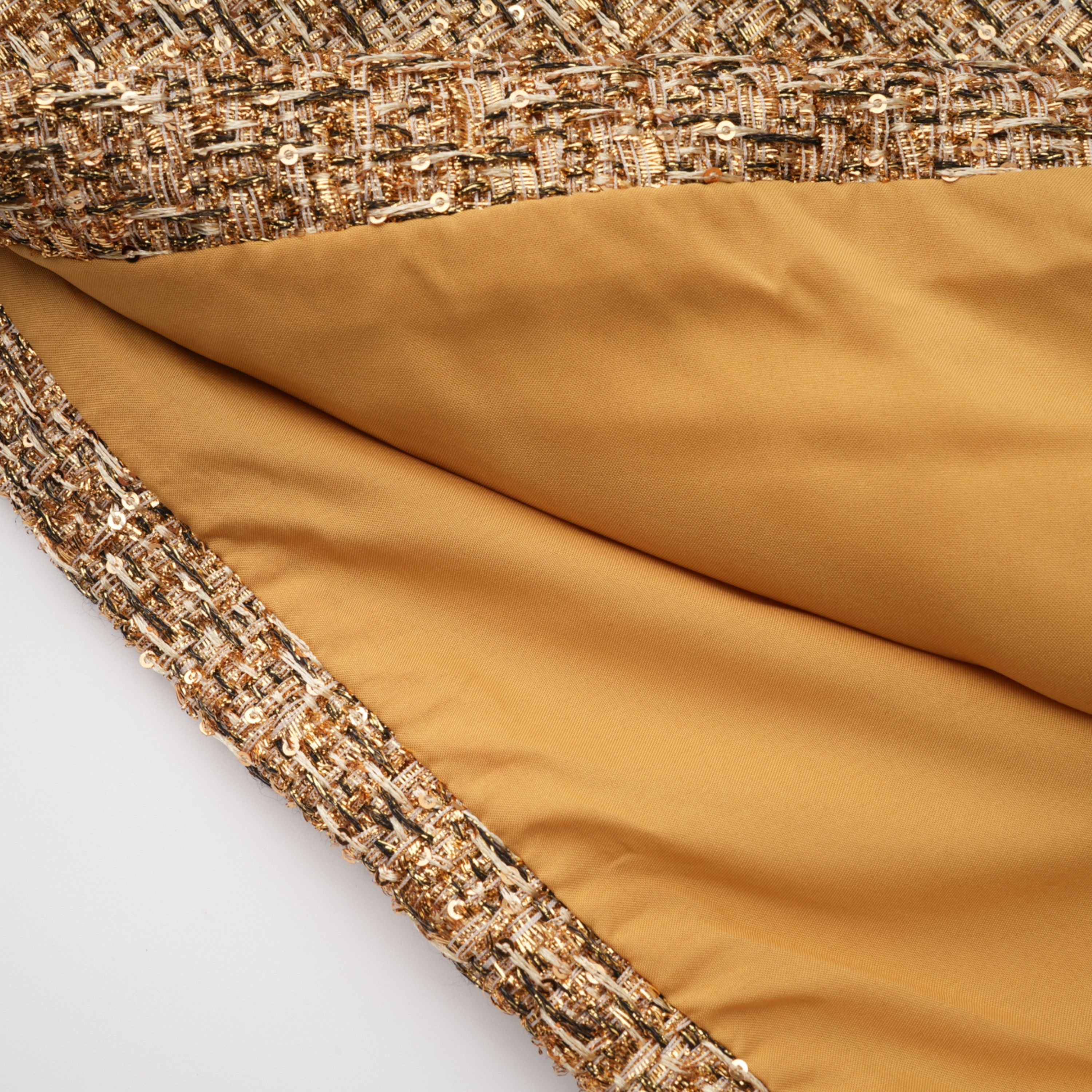 فستان قصير من التويد بياقة على شكل قلب من Arna Gold