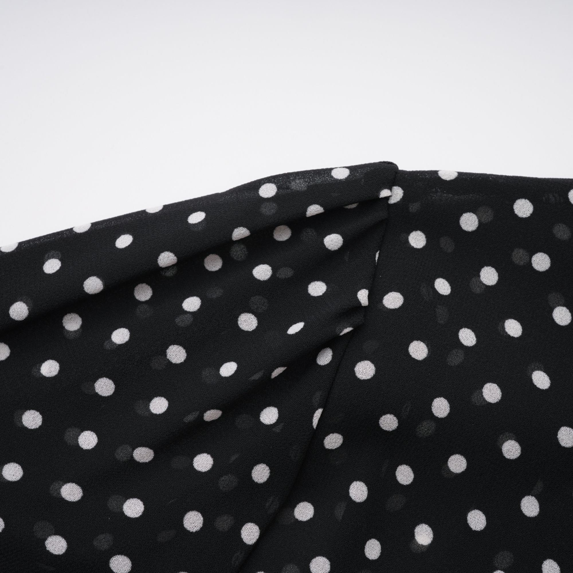 Coraline black polka-dot ruffled midi dress