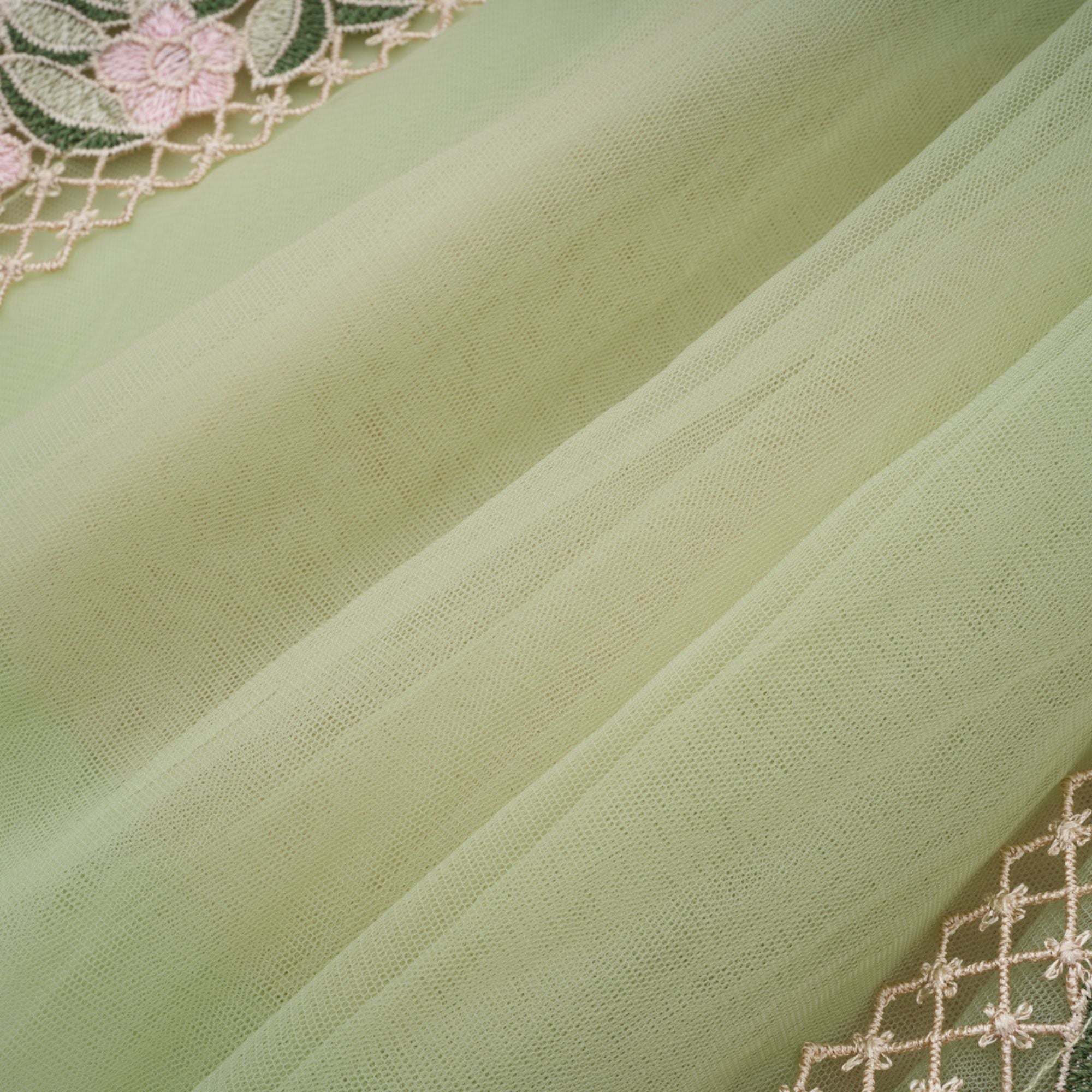 Eleni – Grünes Midikleid mit Tülleinsatz und Blumenmuster