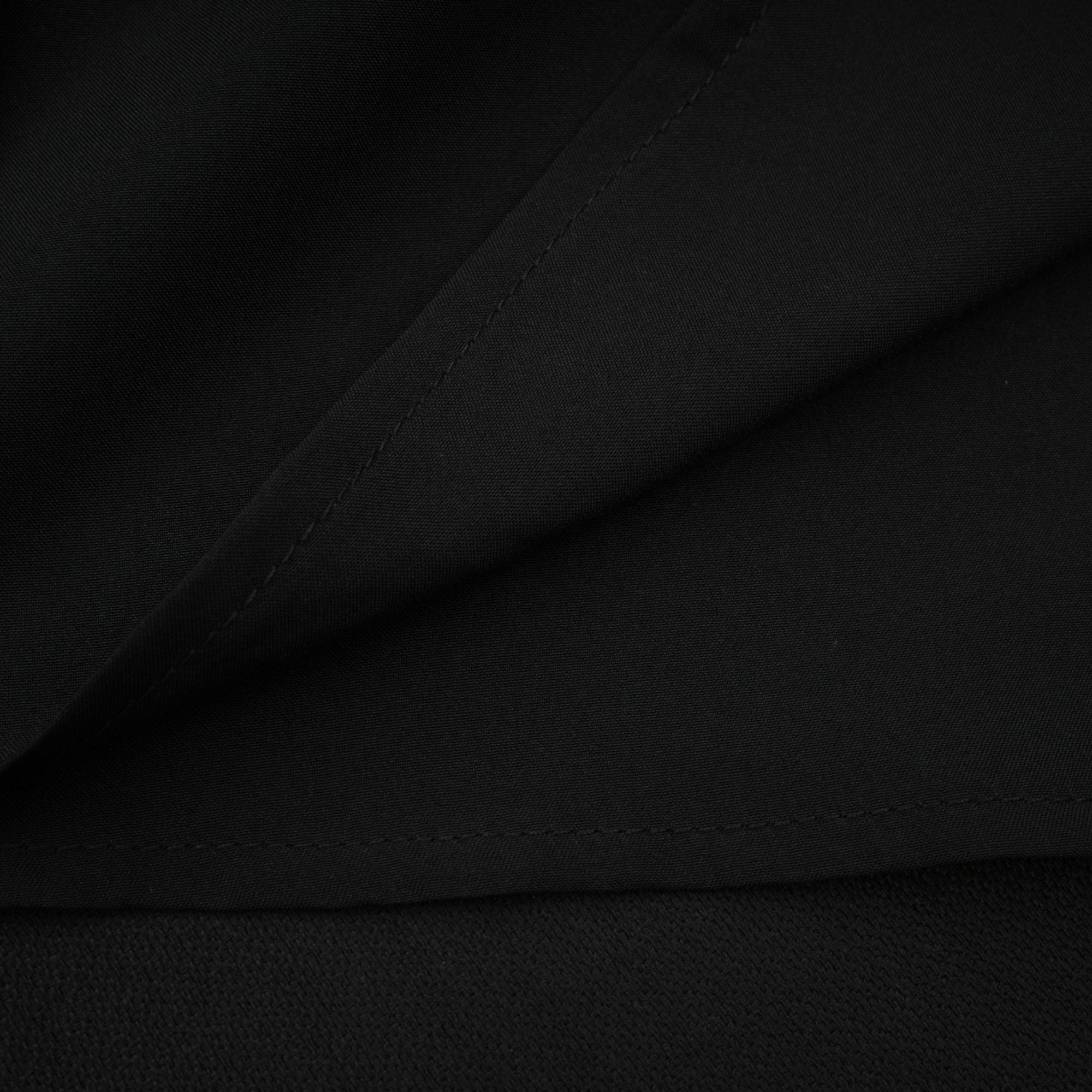 فستان قصير غير متماثل من تصميم Émeline