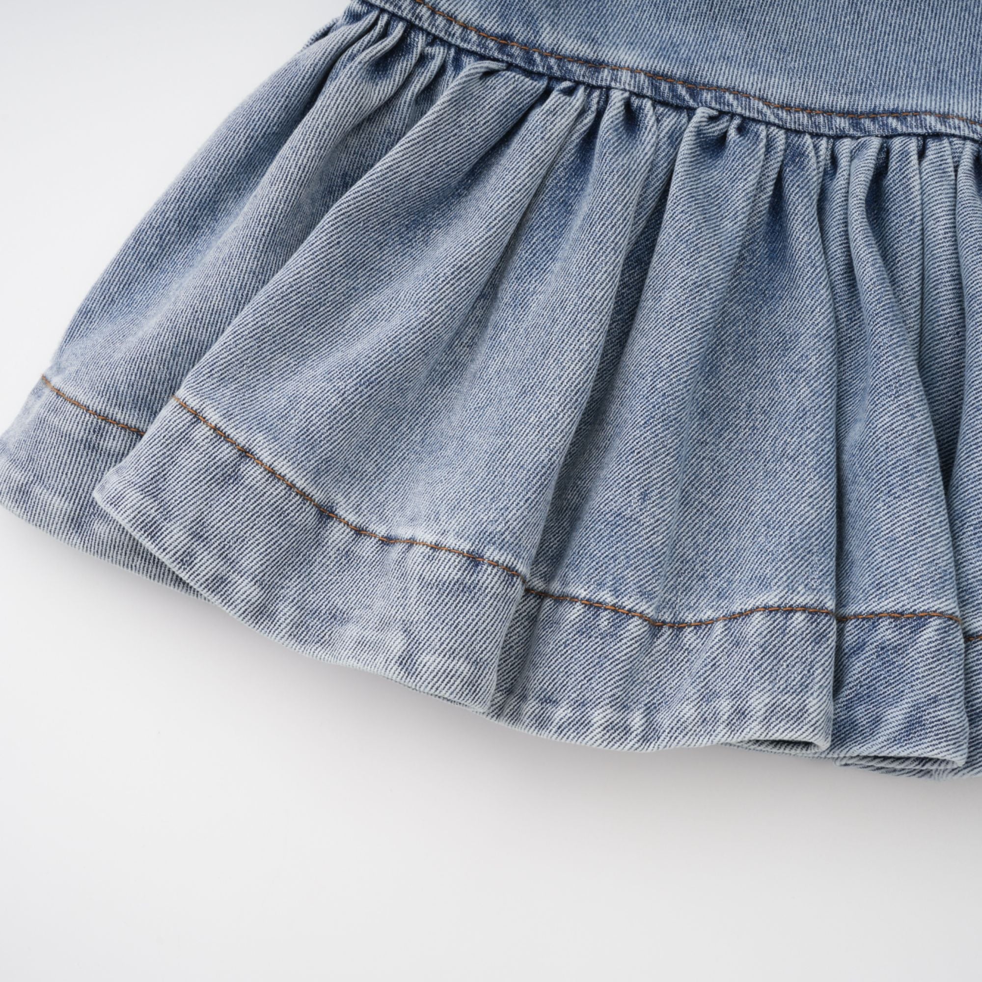 Florence Ruffled Denim Mini Skirt in Light Blue