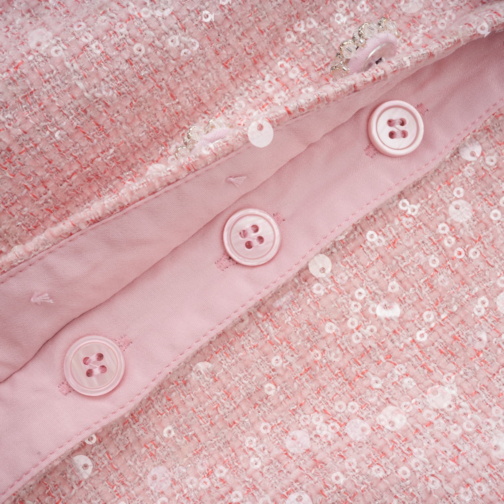 فستان إيليز الوردي المزين بثنيات قصير