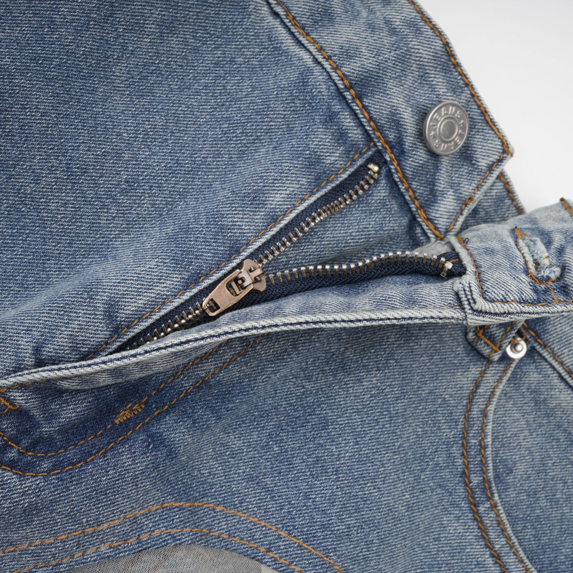 بنطلون جينز Aélis بأجزاء شفافة