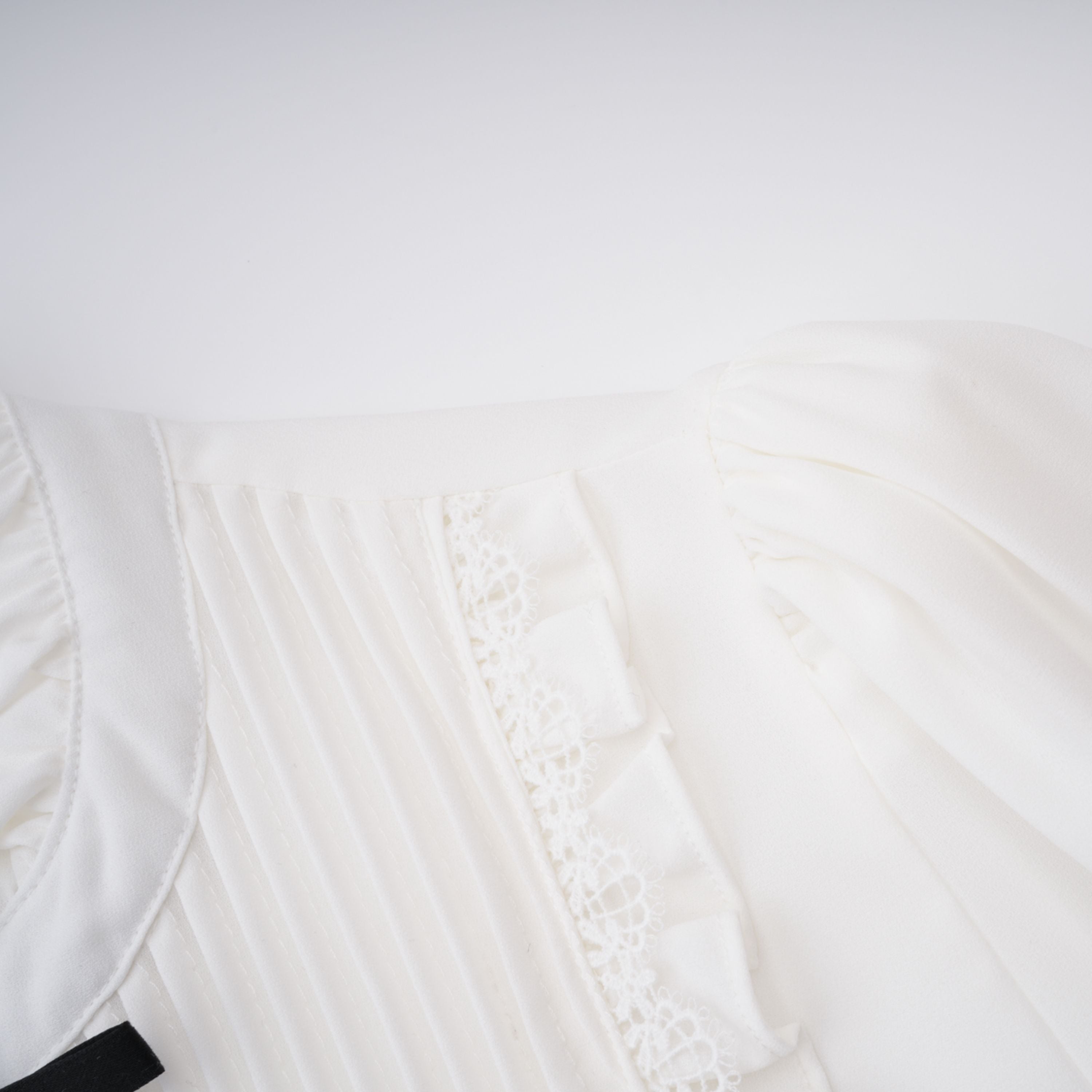 Paulette white bowknot shirred-panel ruffled shirt