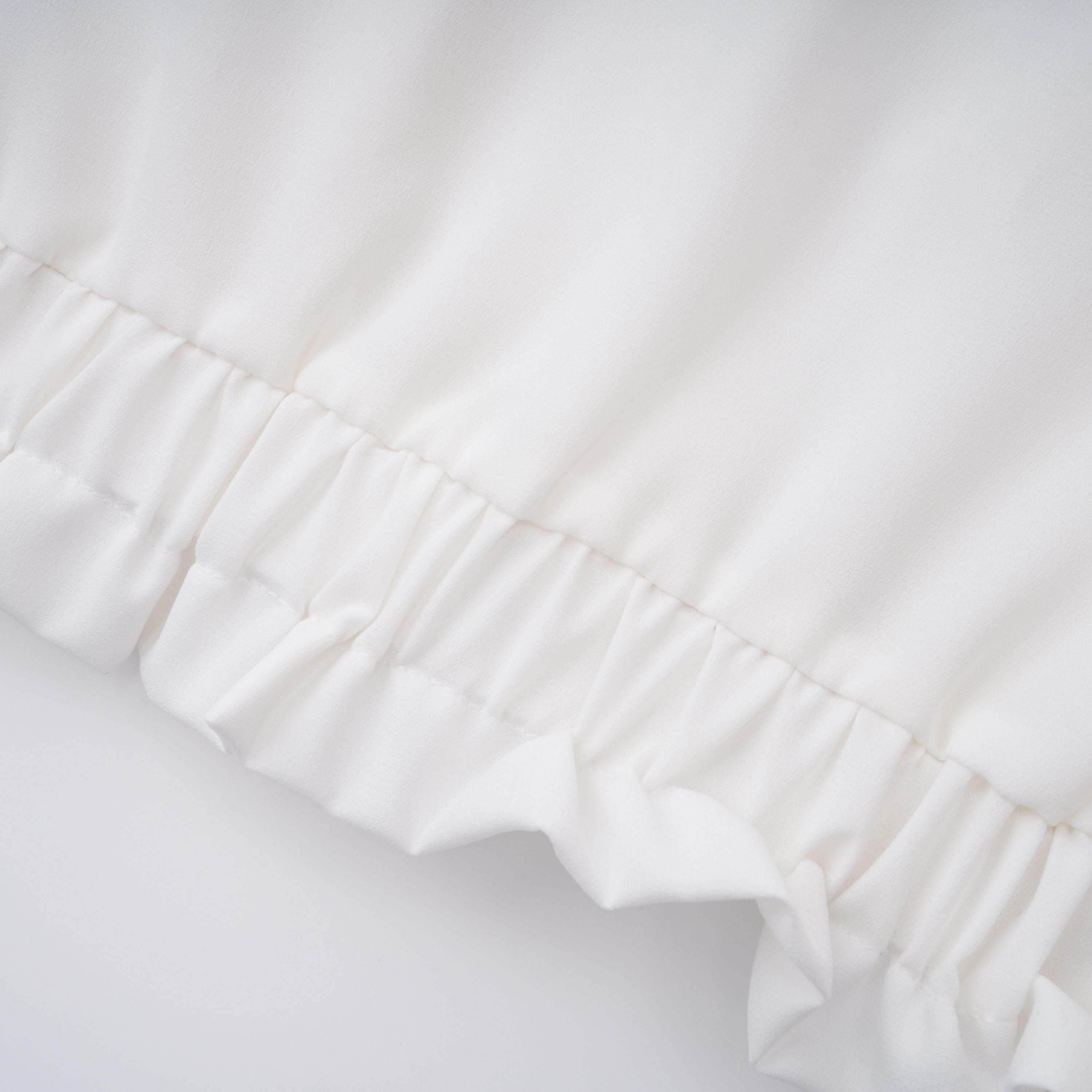 Paulette white bowknot shirred-panel ruffled shirt