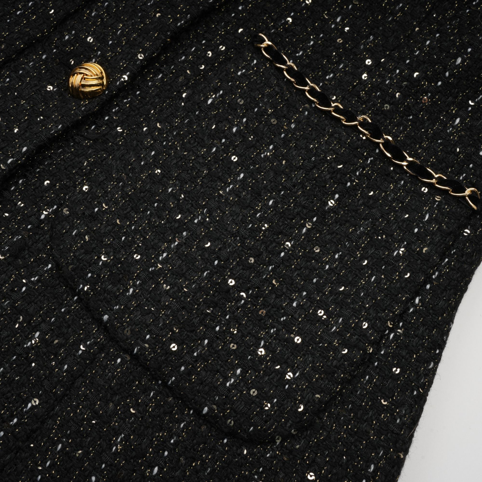 فستان أودري القصير من قماش التويد المزين بالترتر الأسود