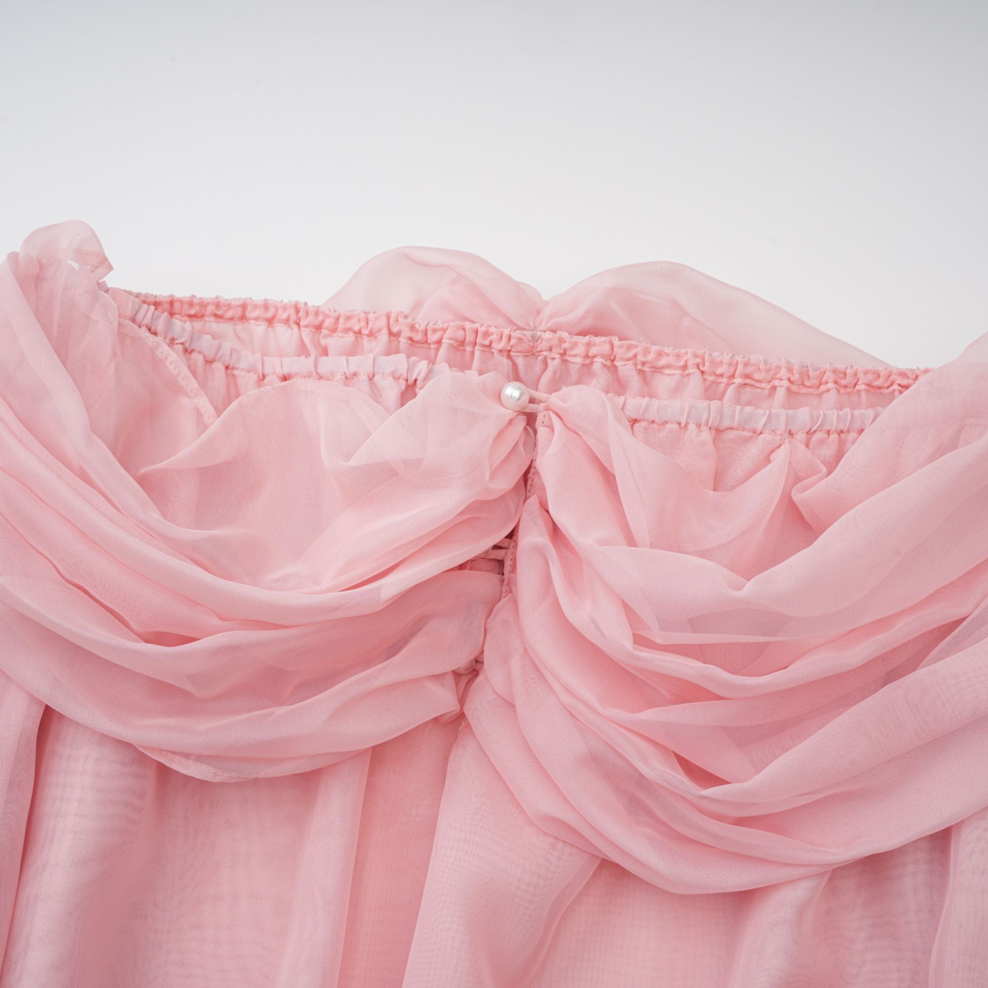 Avril pink bow draped slip mini dress