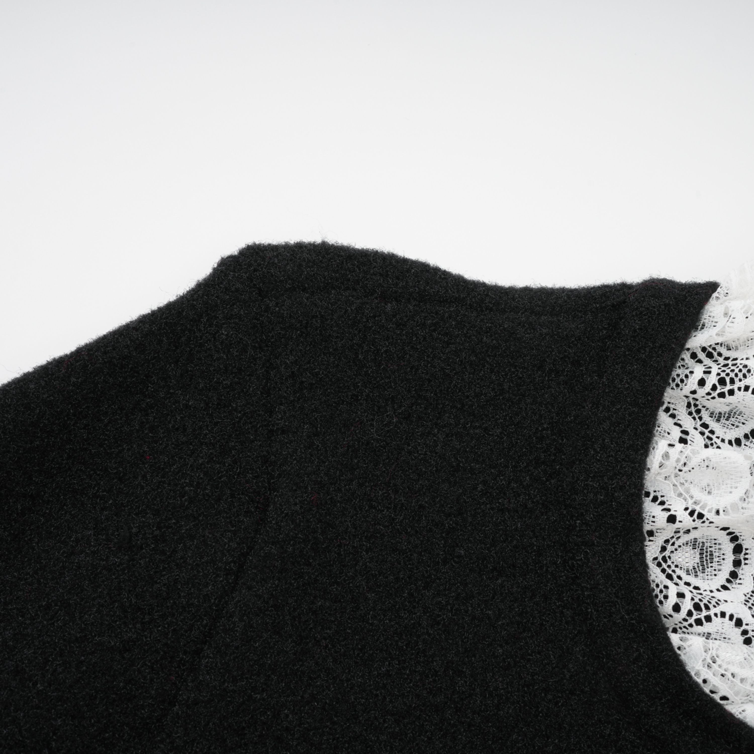 طقم توب وتنورة محبوكة سوداء مزينة من إلينور