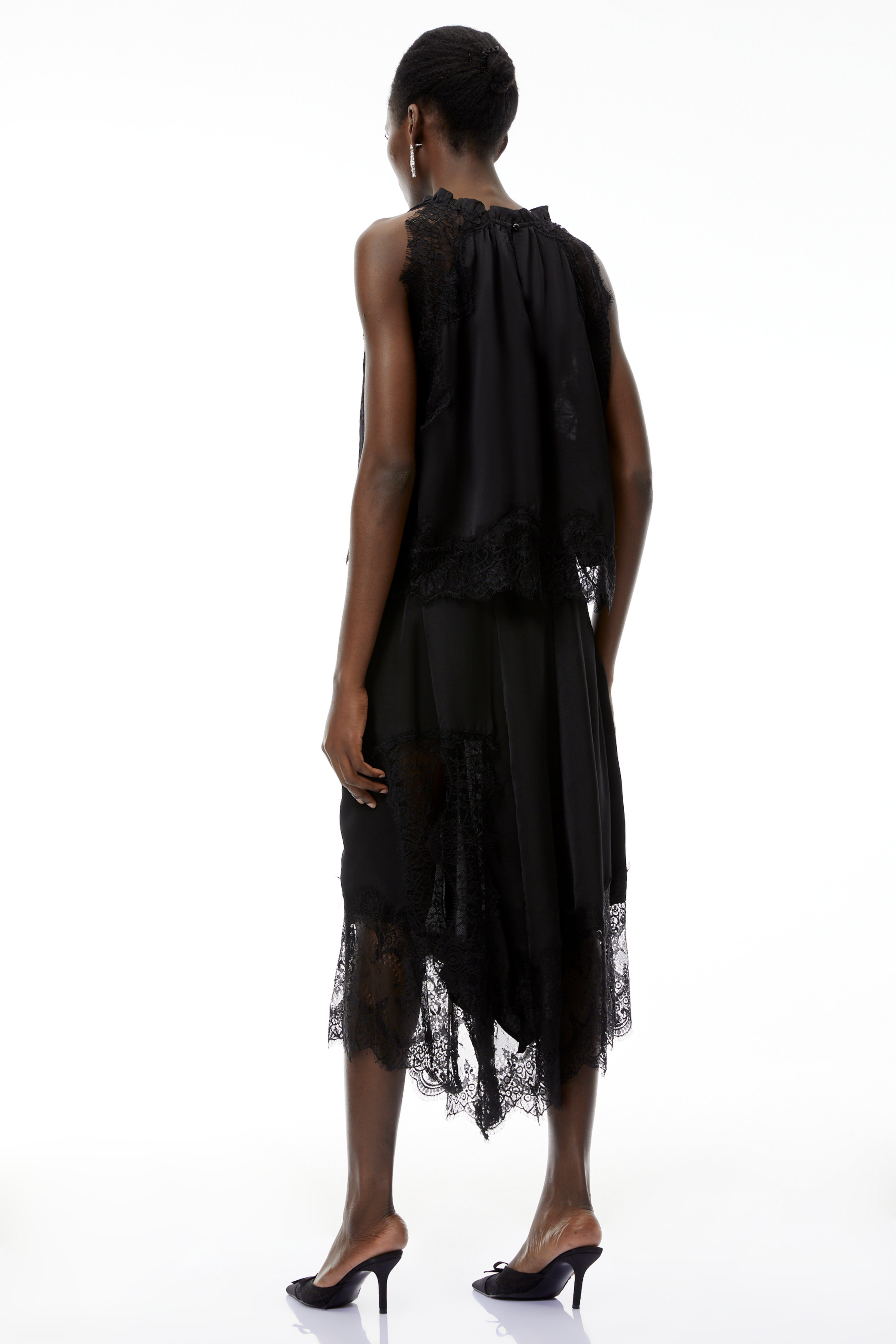 Florence Set aus schwarzem Spitzenoberteil und Rock