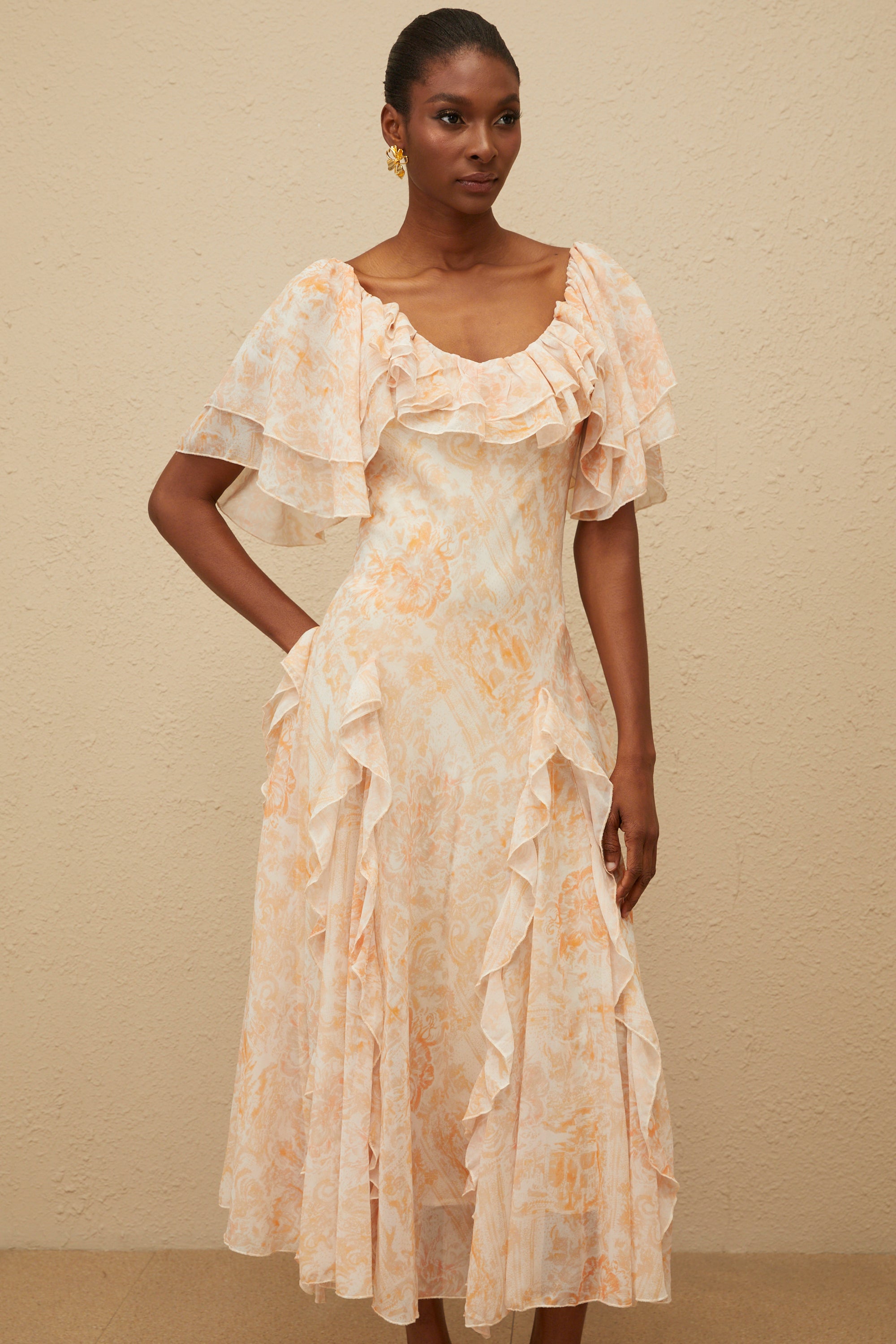 فستان أورور متوسط الطول مزين بكشكشة وزهور