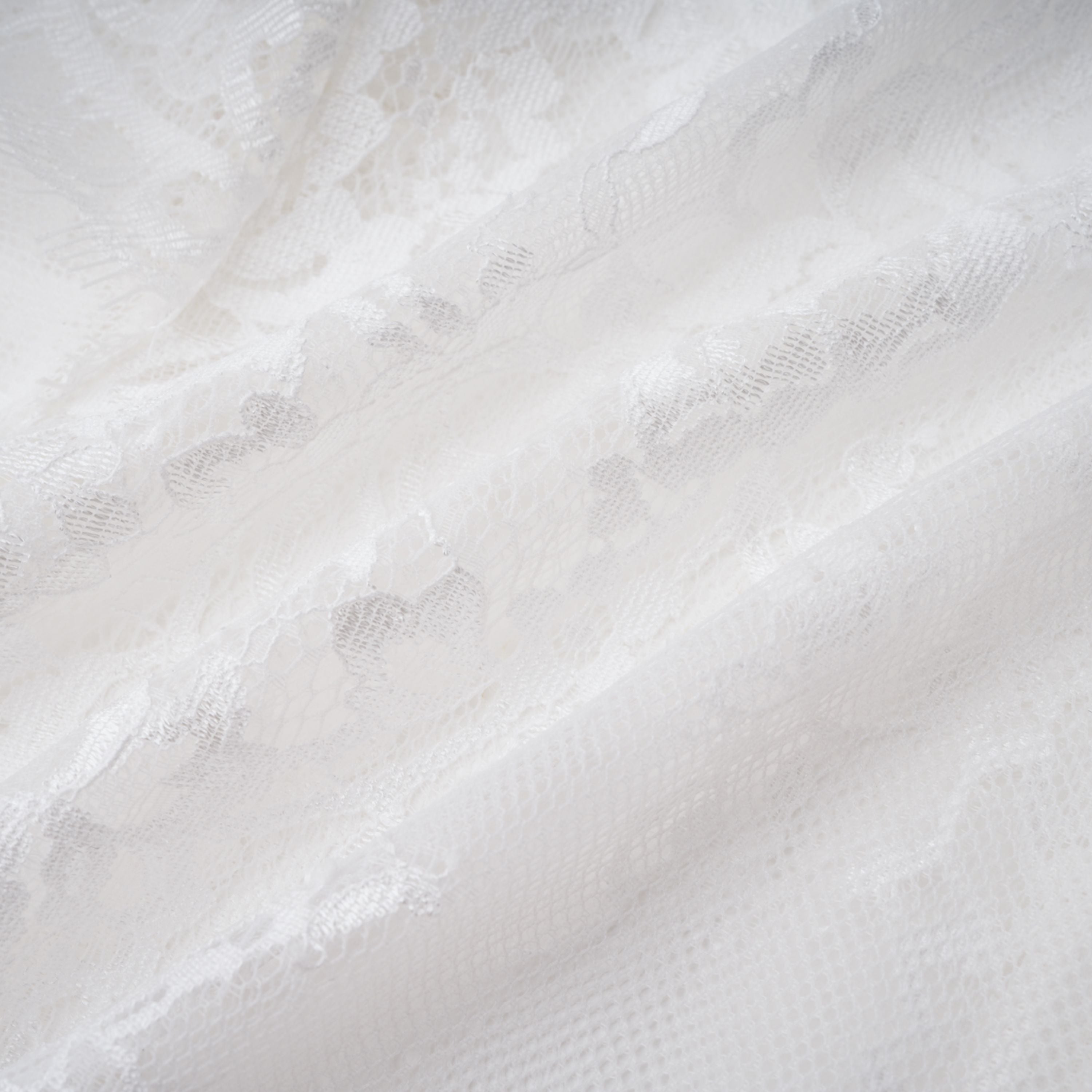 Robe convertible en dentelle blanche à manches longues