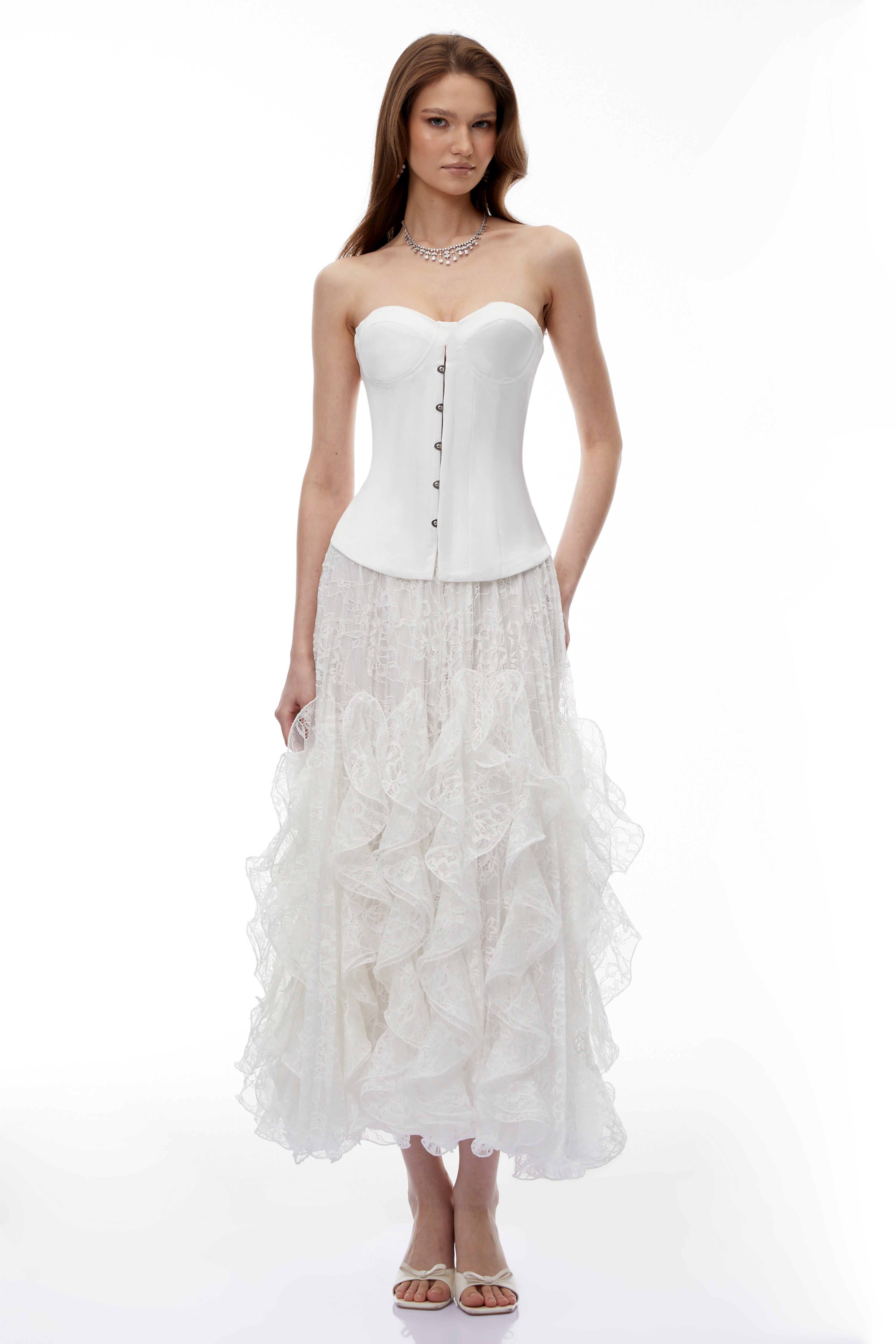 بلوزة بوستييه بيضاء لامعة من Pantea